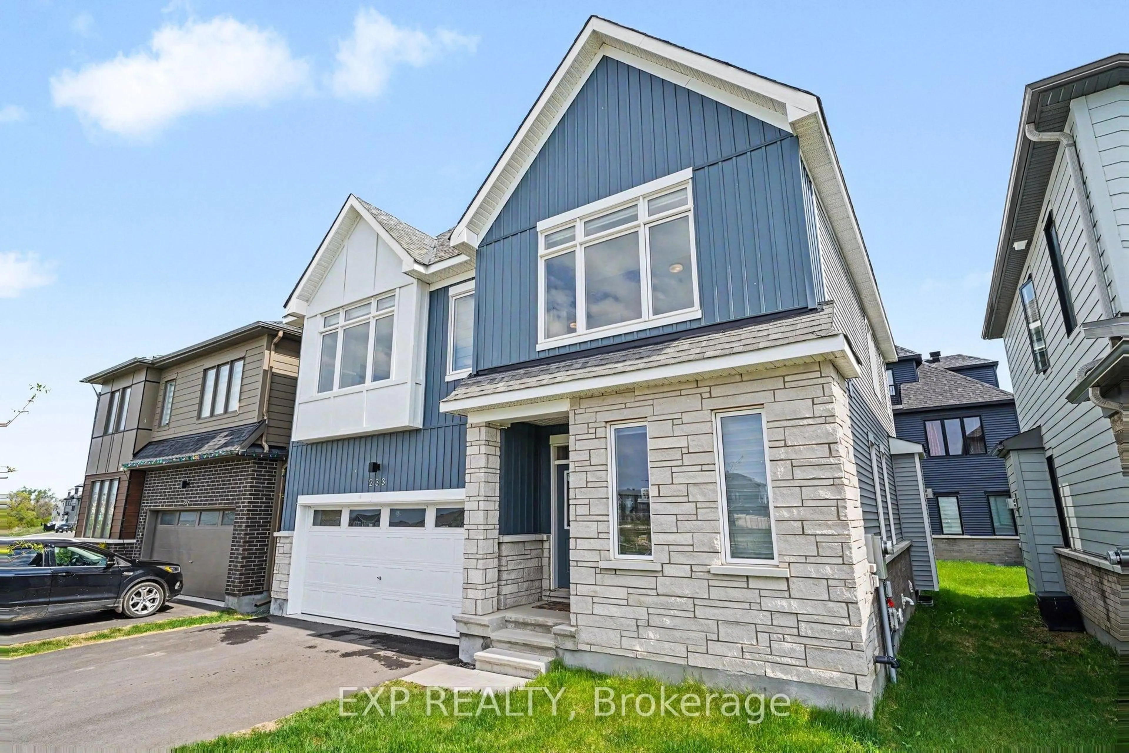 Home with vinyl exterior material, street for 233 Conservancy Dr, Ottawa Ontario K2J 7M5