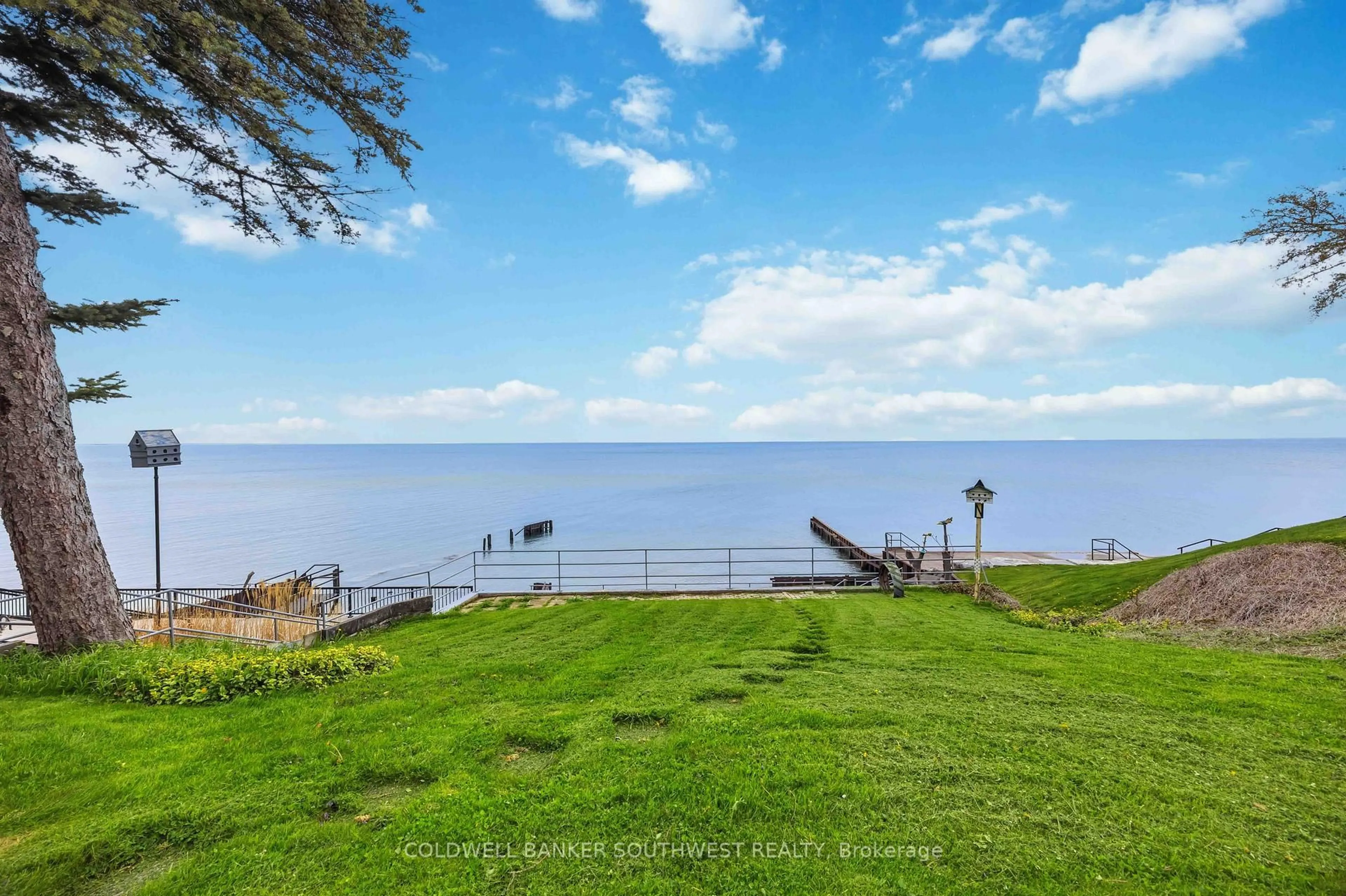A pic from outside/outdoor area/front of a property/back of a property/a pic from drone, water/lake/river/ocean view for 2088 Lakeshore Rd, Sarnia Ontario N7T 7H6