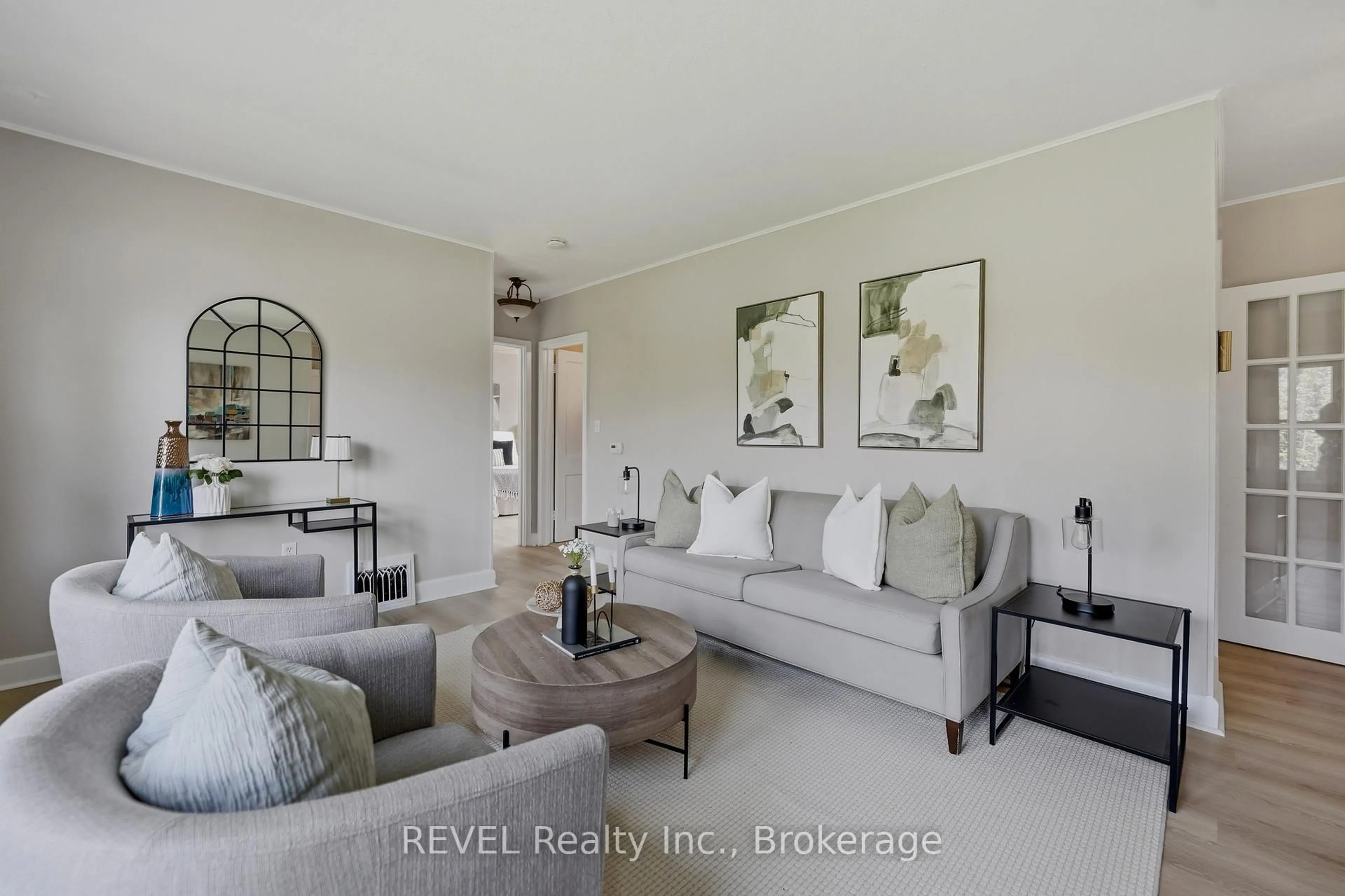 Living room with furniture, ceramic/tile floor for 7962 Booth St, Niagara Falls Ontario L2H 1E8