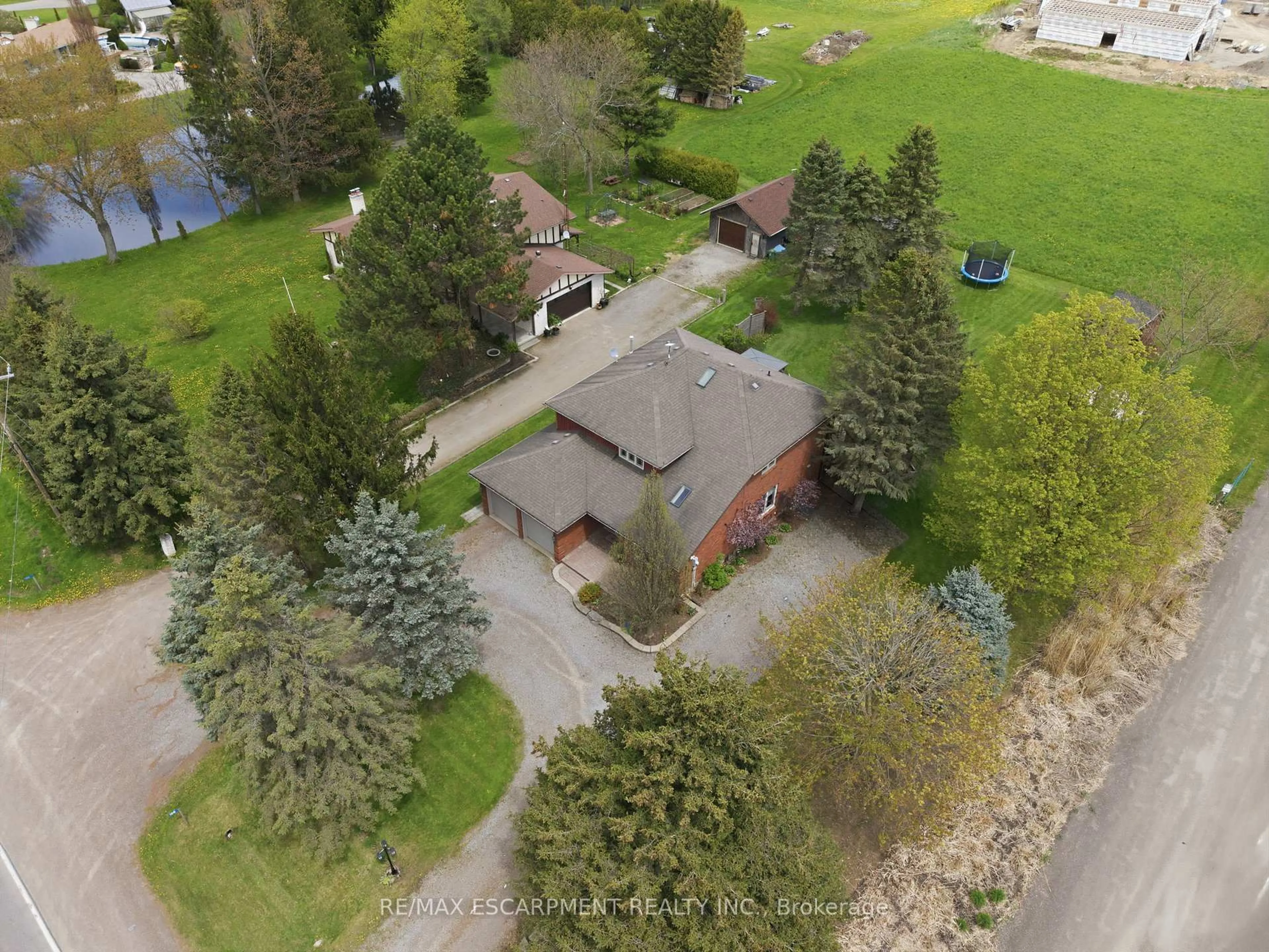 A pic from outside/outdoor area/front of a property/back of a property/a pic from drone, street for 108 Highway 52, Hamilton Ontario L0R 1T0