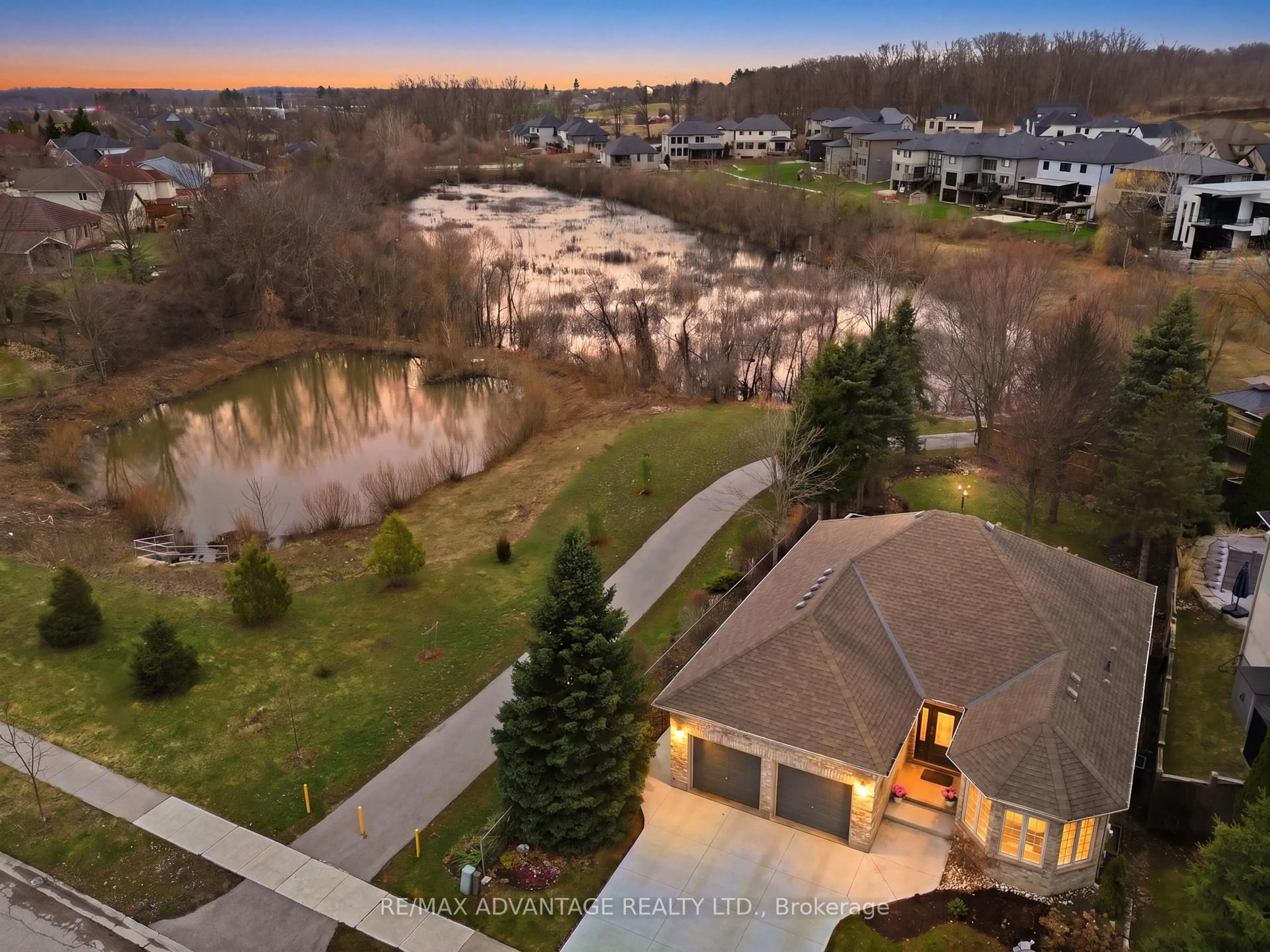 A pic from outside/outdoor area/front of a property/back of a property/a pic from drone, water/lake/river/ocean view for 993 Gabor St, London South Ontario N6K 4V5