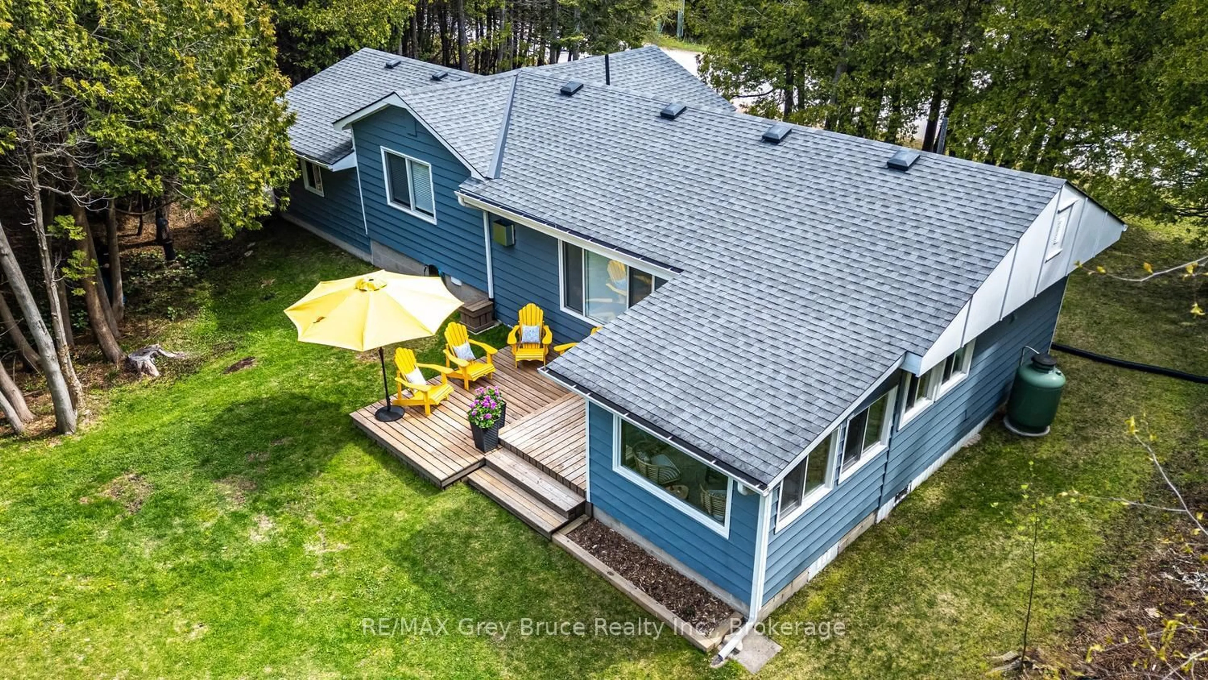 A pic from outside/outdoor area/front of a property/back of a property/a pic from drone, water/lake/river/ocean view for 188 Bay St, South Bruce Peninsula Ontario N0H 2T0