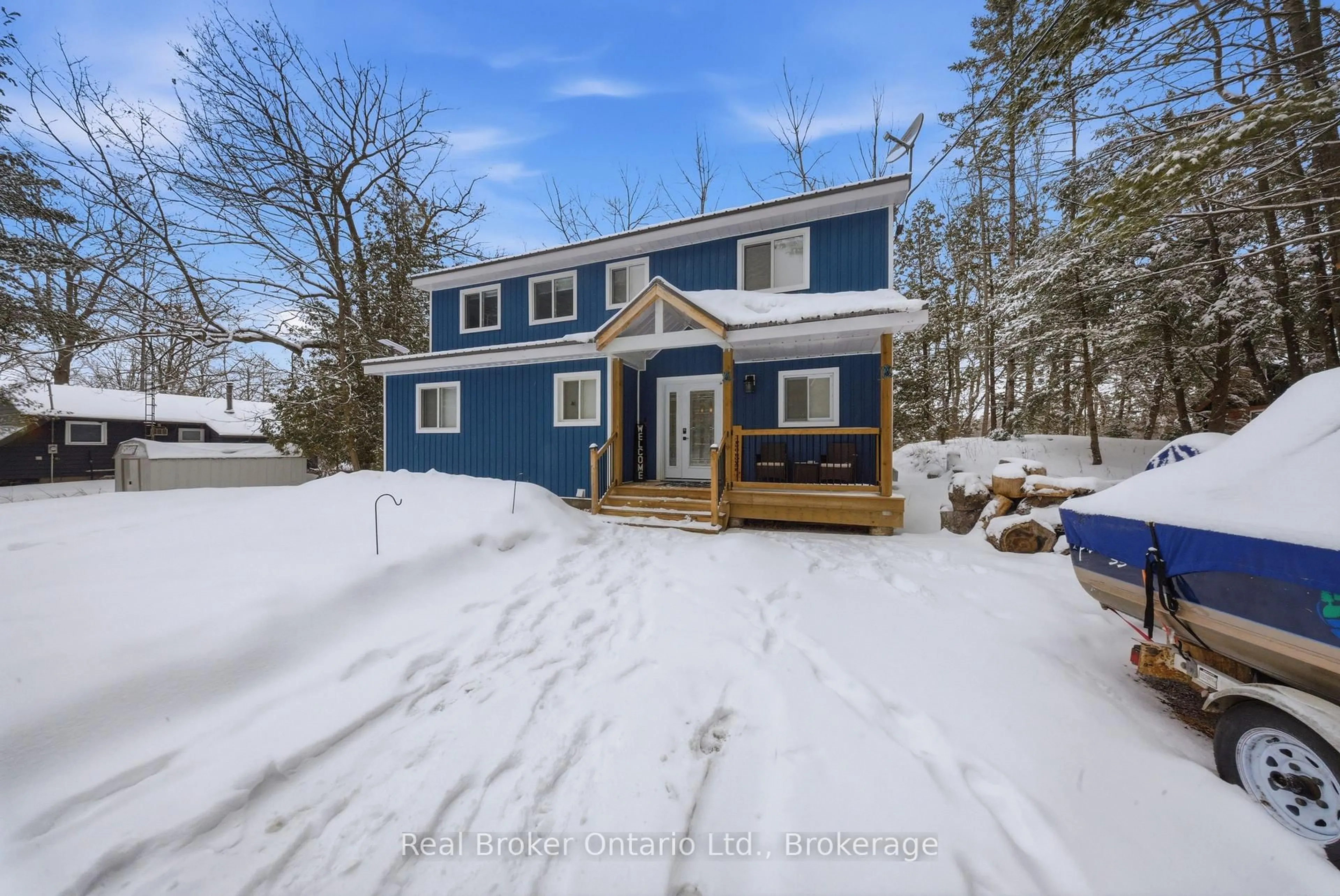 A pic from outside/outdoor area/front of a property/back of a property/a pic from drone, street for 135 Camp Lane, Tweed Ontario K0K 3J0