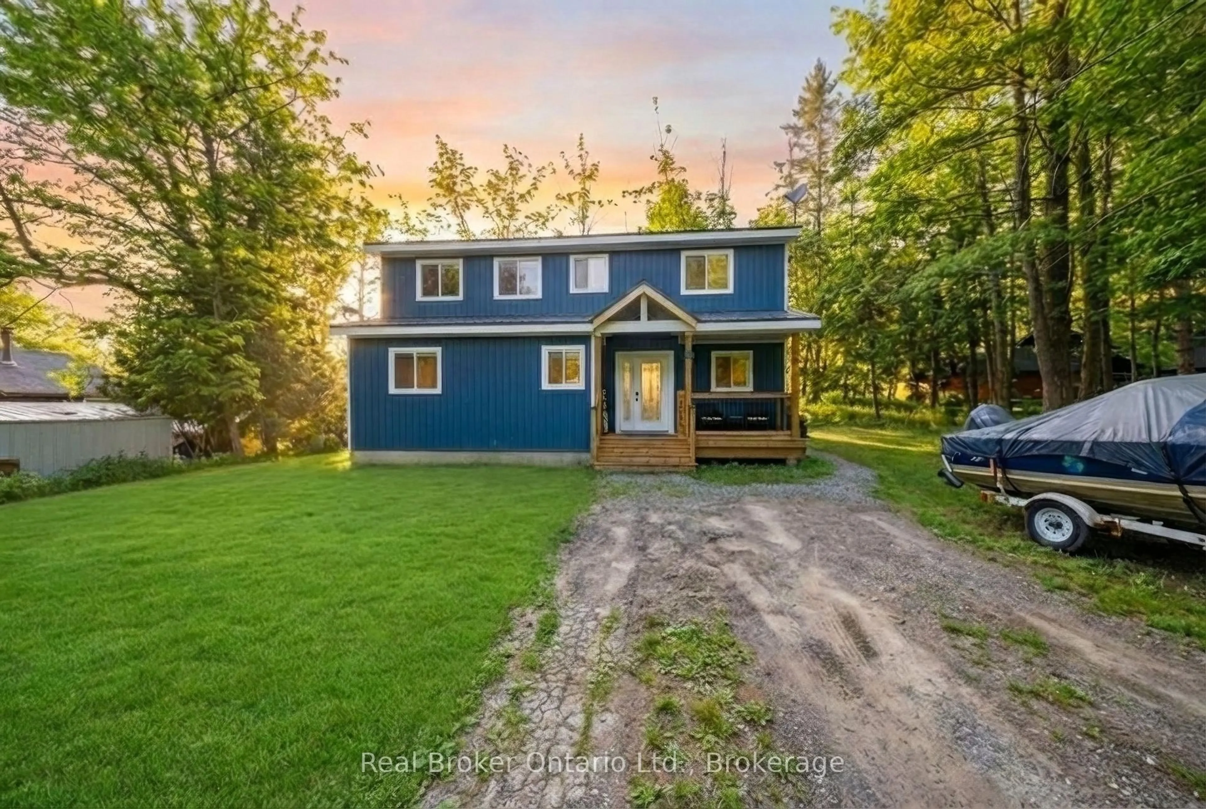 A pic from outside/outdoor area/front of a property/back of a property/a pic from drone, unknown for 135 Camp Lane, Tweed Ontario K0K 3J0