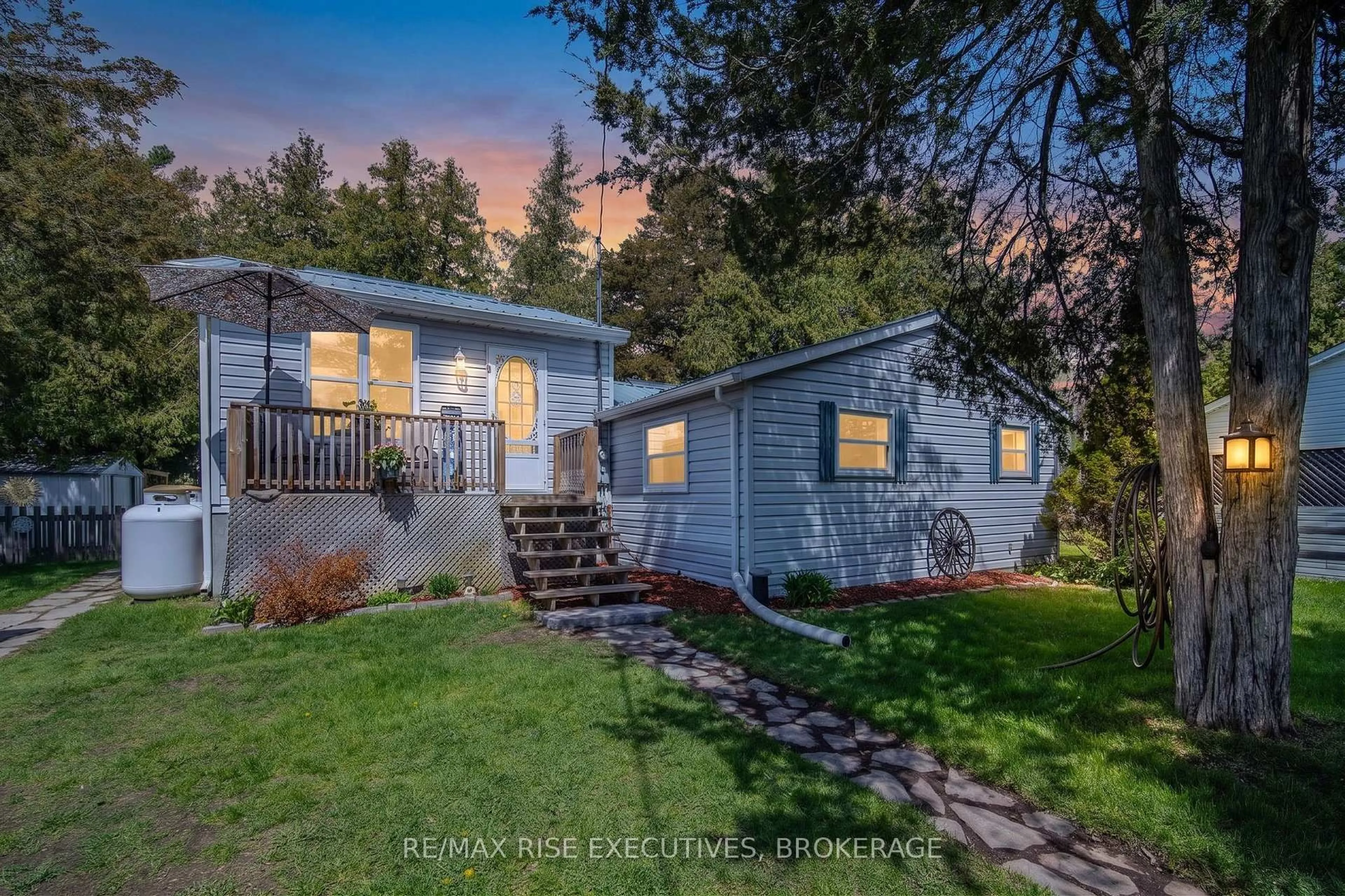 A pic from outside/outdoor area/front of a property/back of a property/a pic from drone, street for 193 Red Cedar Point Rd, Yarker Ontario K0K 3N0