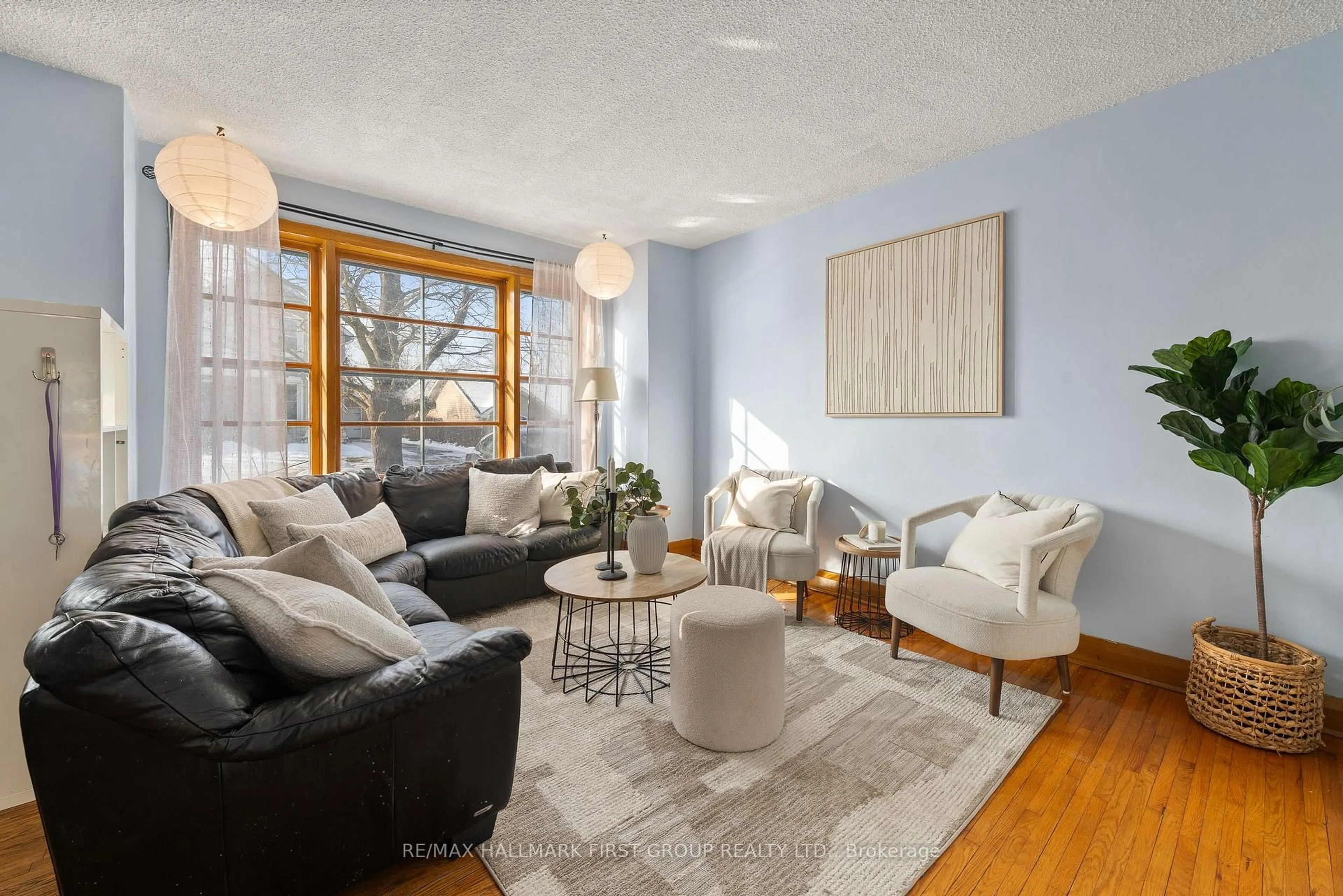 Living room with furniture, wood/laminate floor for 93 John St, Stirling Ontario K0K 3E0