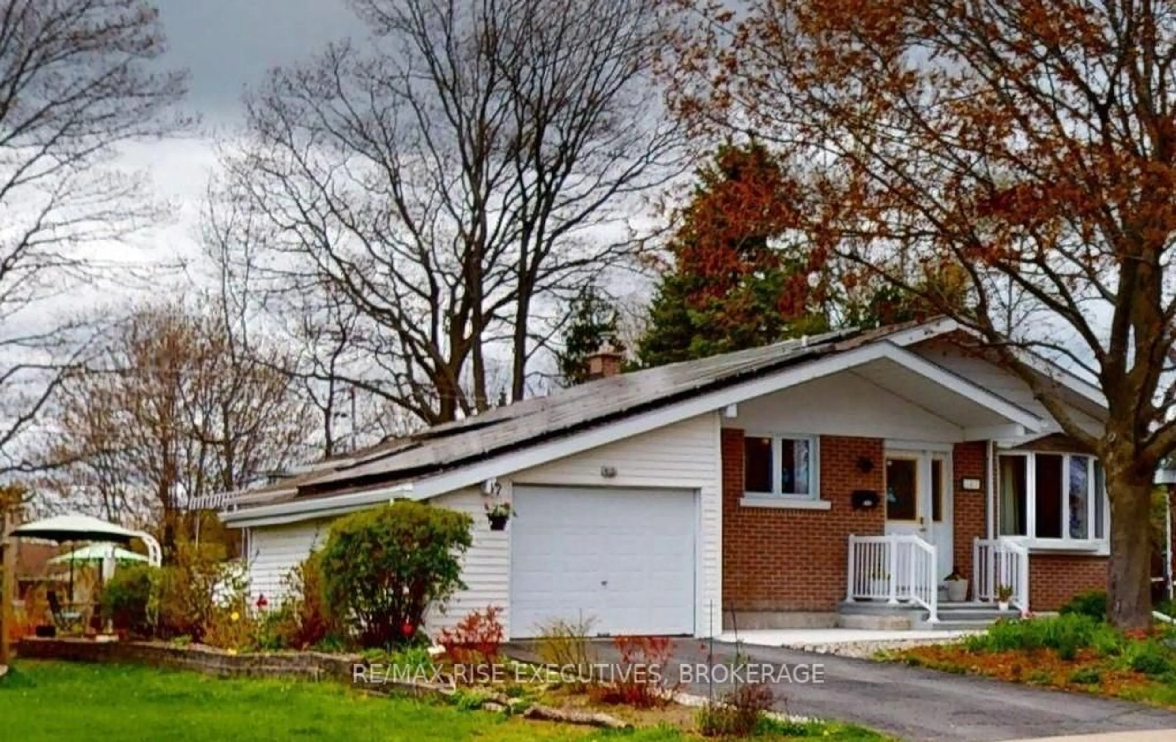 Home with vinyl exterior material, street for 147 Braemar Rd, Kingston Ontario K7M 4B7