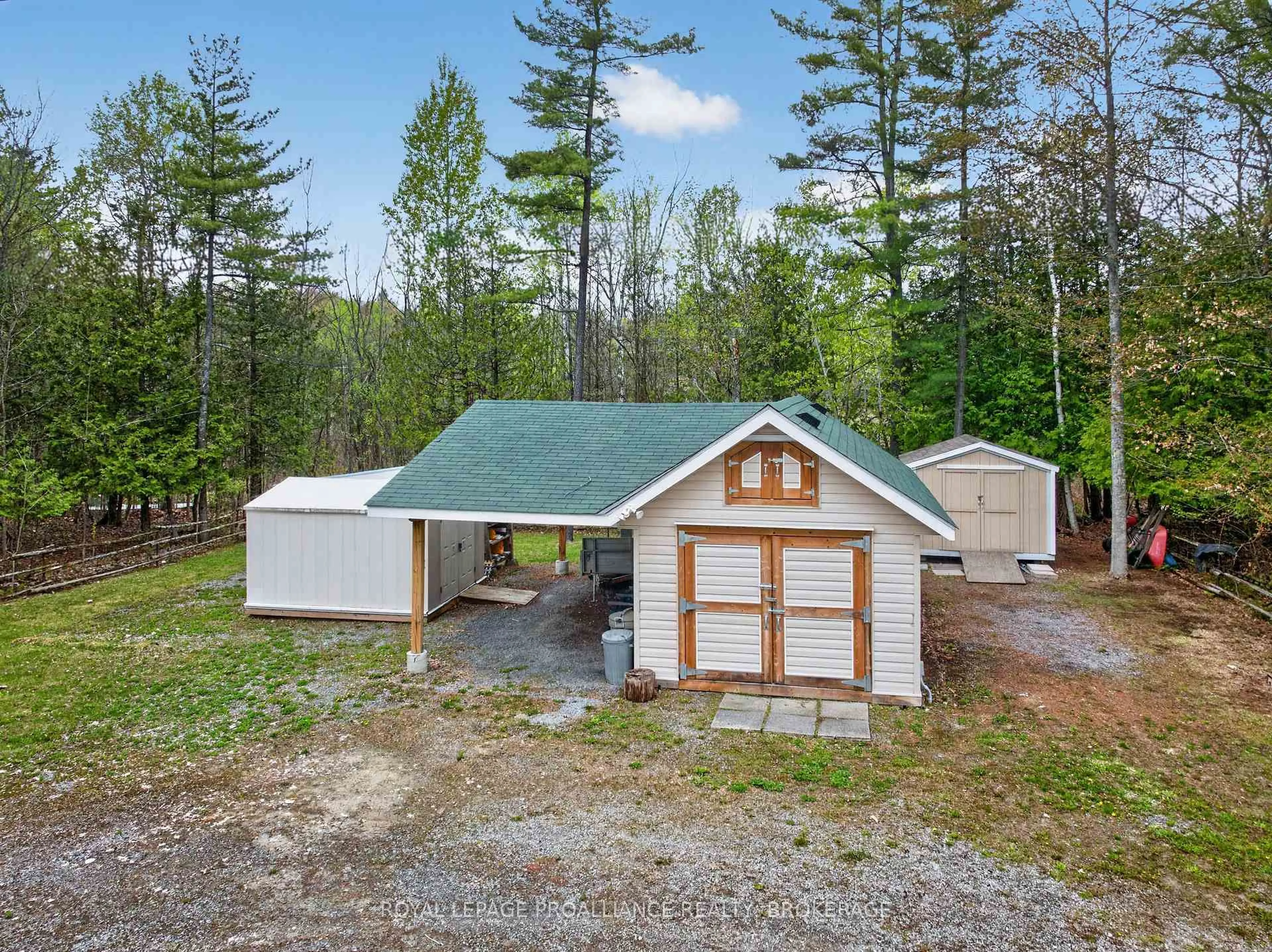 A pic from outside/outdoor area/front of a property/back of a property/a pic from drone, unknown for 59 West Shore Lane, Godfrey Ontario K0H 1T0