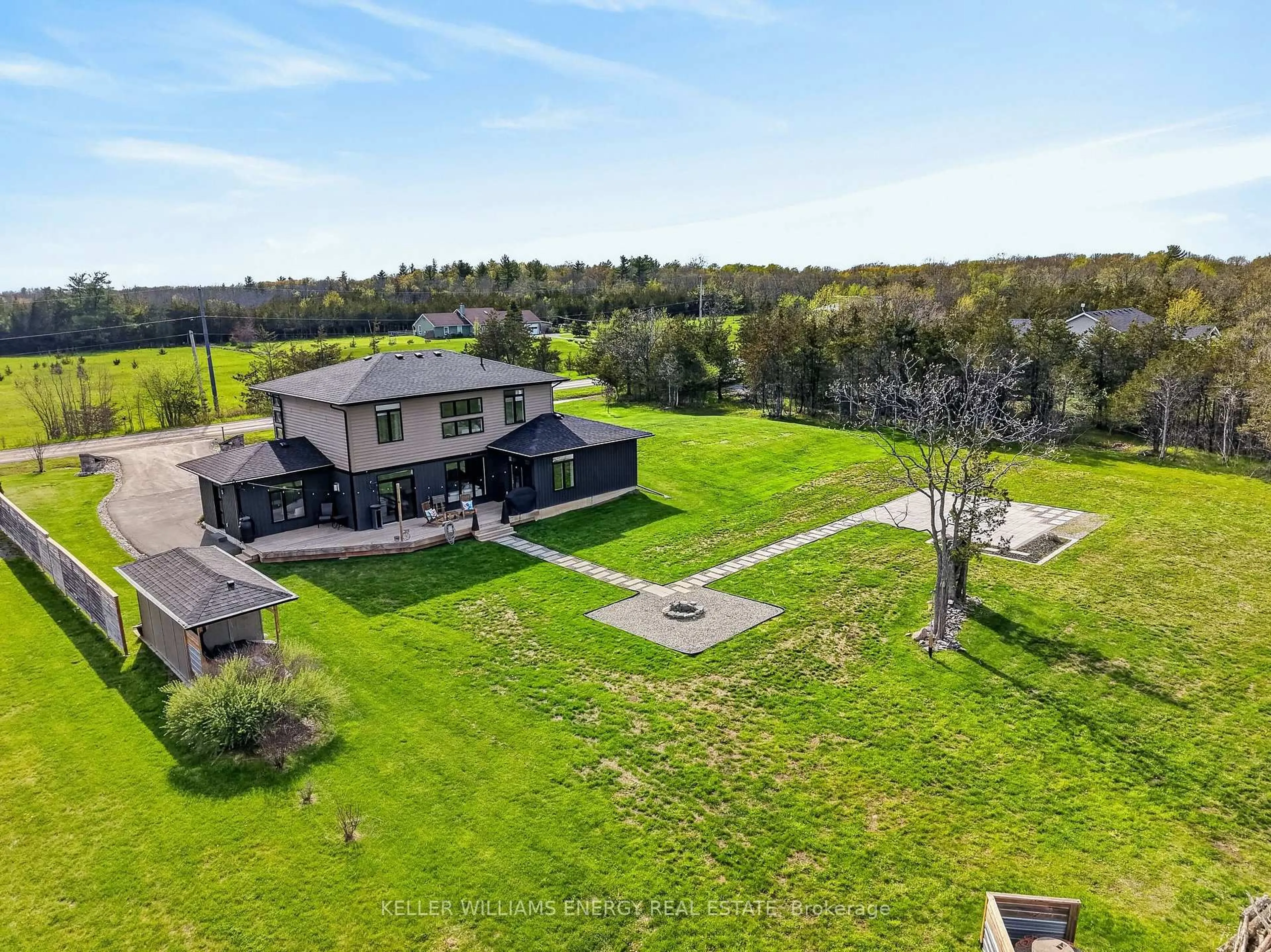 A pic from outside/outdoor area/front of a property/back of a property/a pic from drone, water/lake/river/ocean view for 108 Foster Rd, Prince Edward County Ontario K0K 1W0