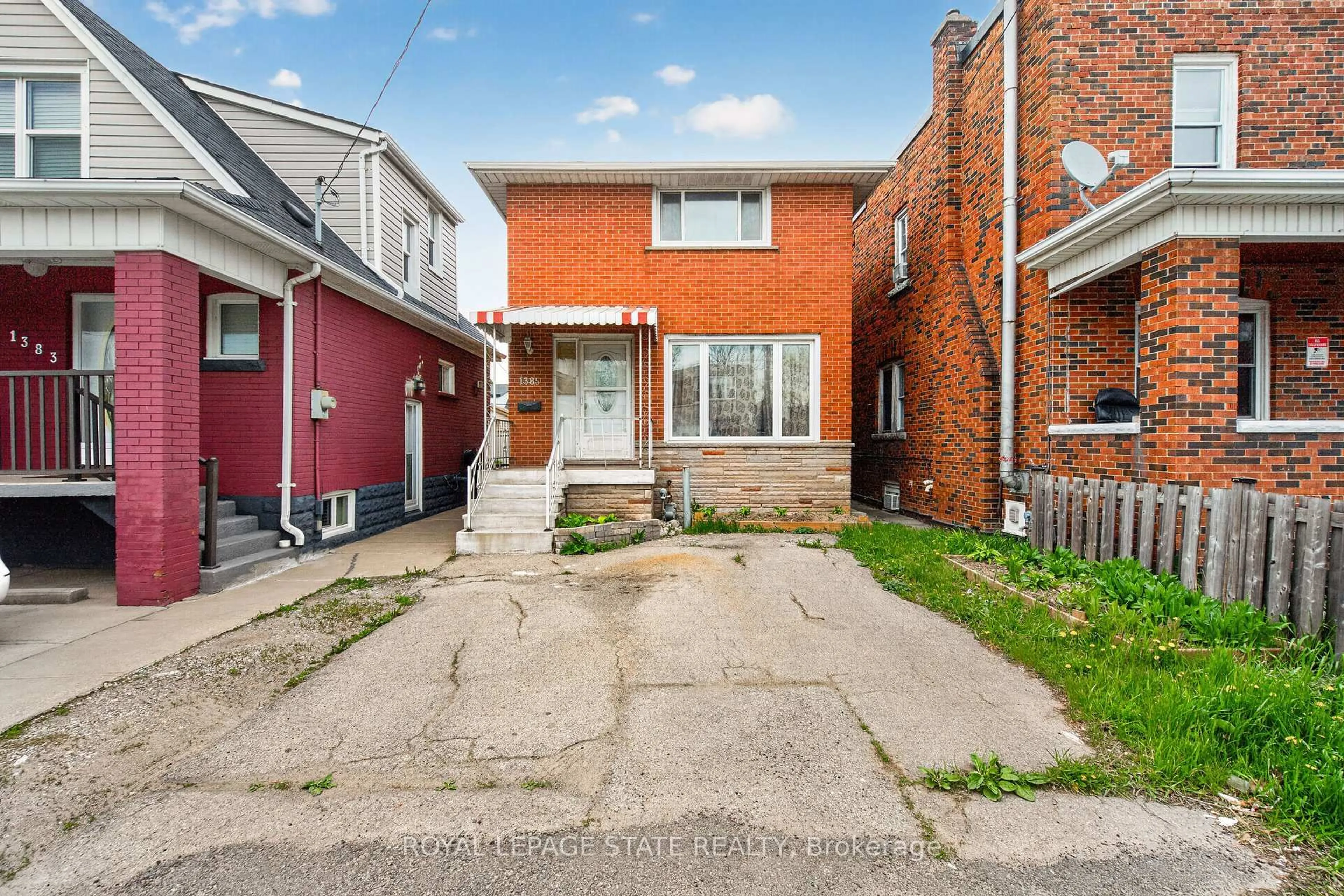 Home with brick exterior material, street for 1385 Barton St, Hamilton Ontario L8H 2W4