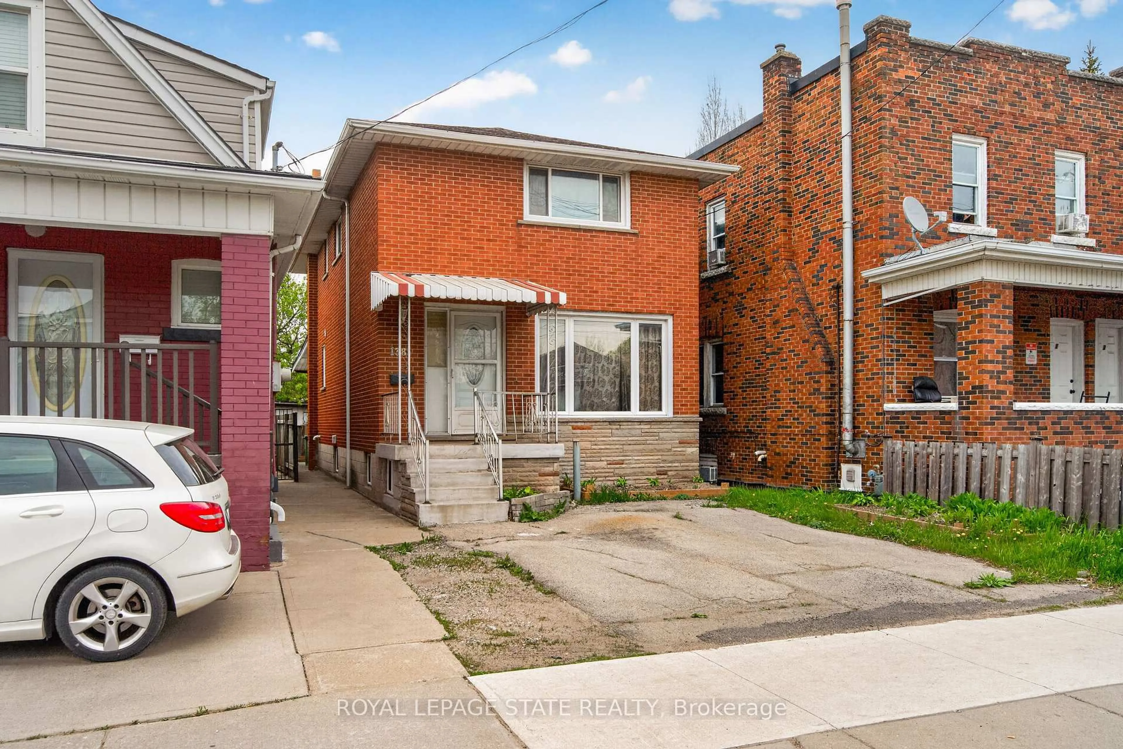 Home with brick exterior material, street for 1385 Barton St, Hamilton Ontario L8H 2W4
