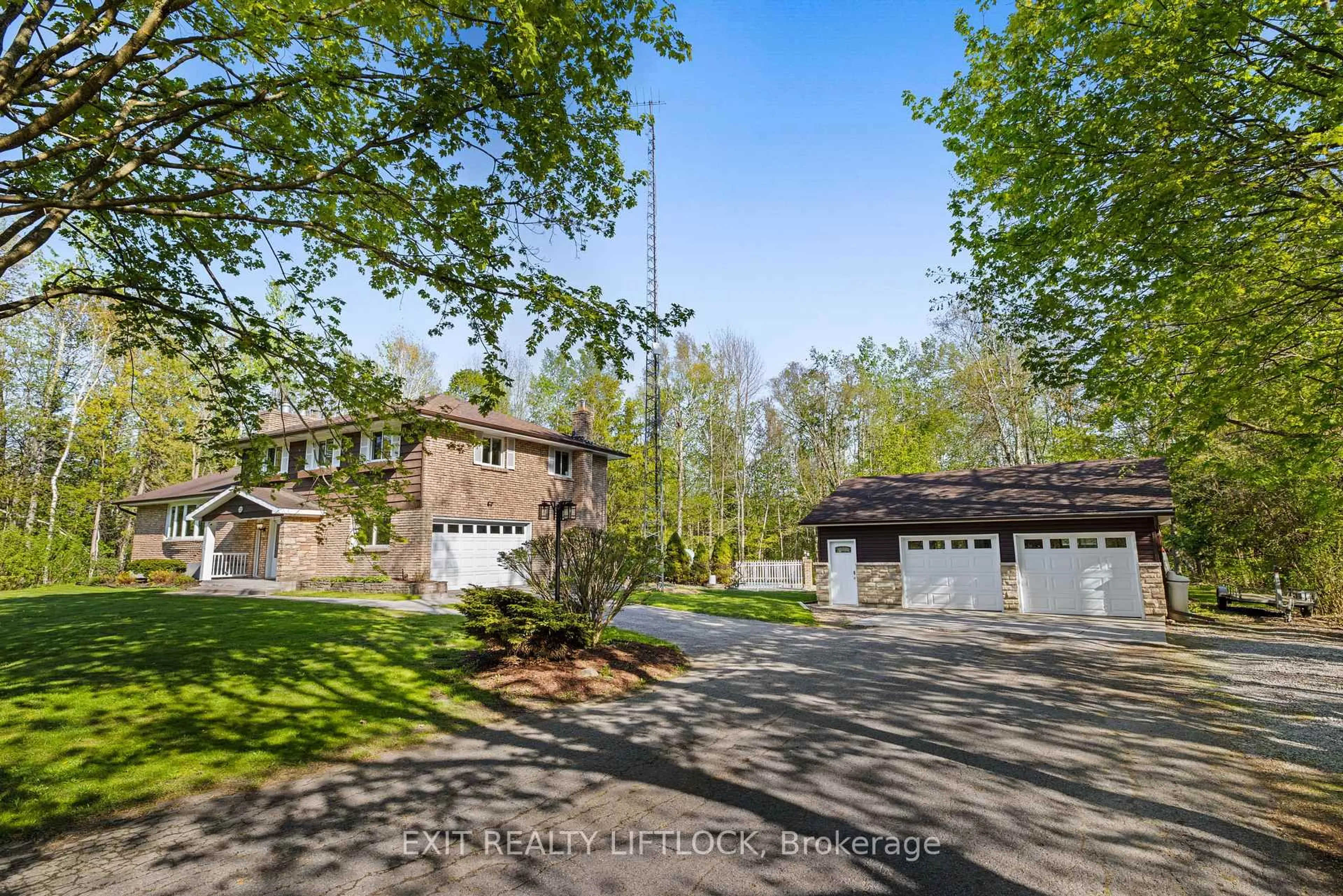 A pic from outside/outdoor area/front of a property/back of a property/a pic from drone, street for 2225 Parkhill Rd, Cavan Monaghan Ontario K9J 6X4