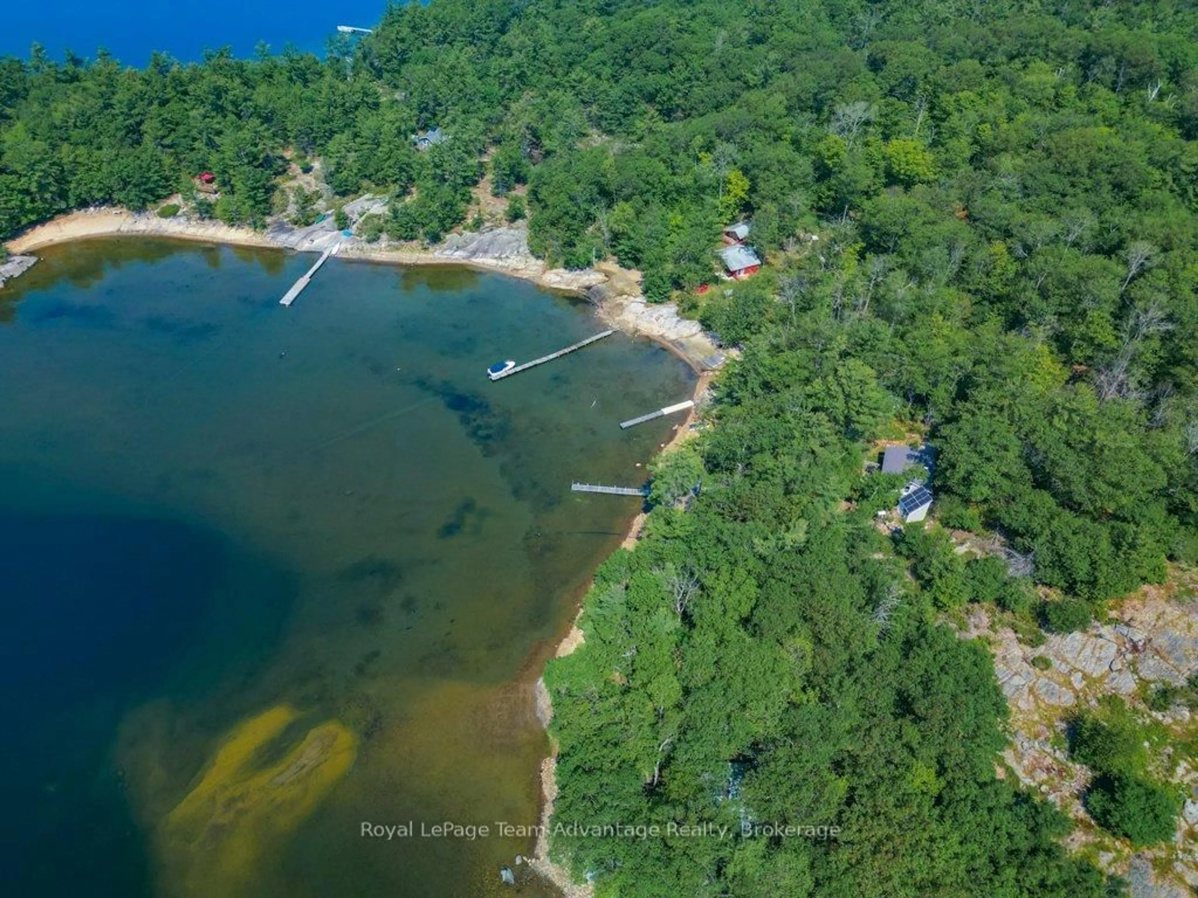 A pic from outside/outdoor area/front of a property/back of a property/a pic from drone, water/lake/river/ocean view for 46 Huckleberry Island, Carling Ontario P0G 1G0
