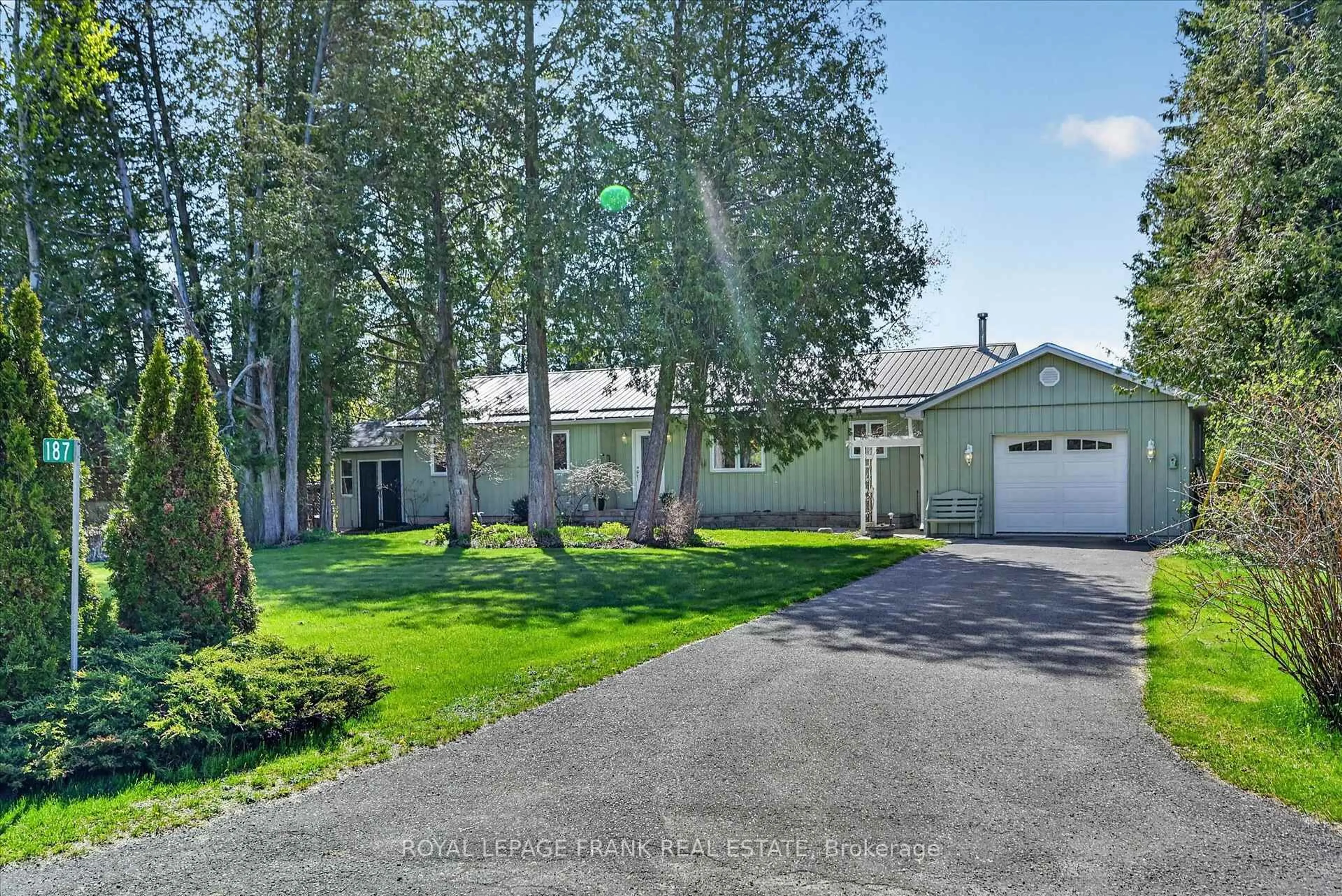 A pic from outside/outdoor area/front of a property/back of a property/a pic from drone, street for 187 River Lane, Douro-Dummer Ontario K0L 3A0