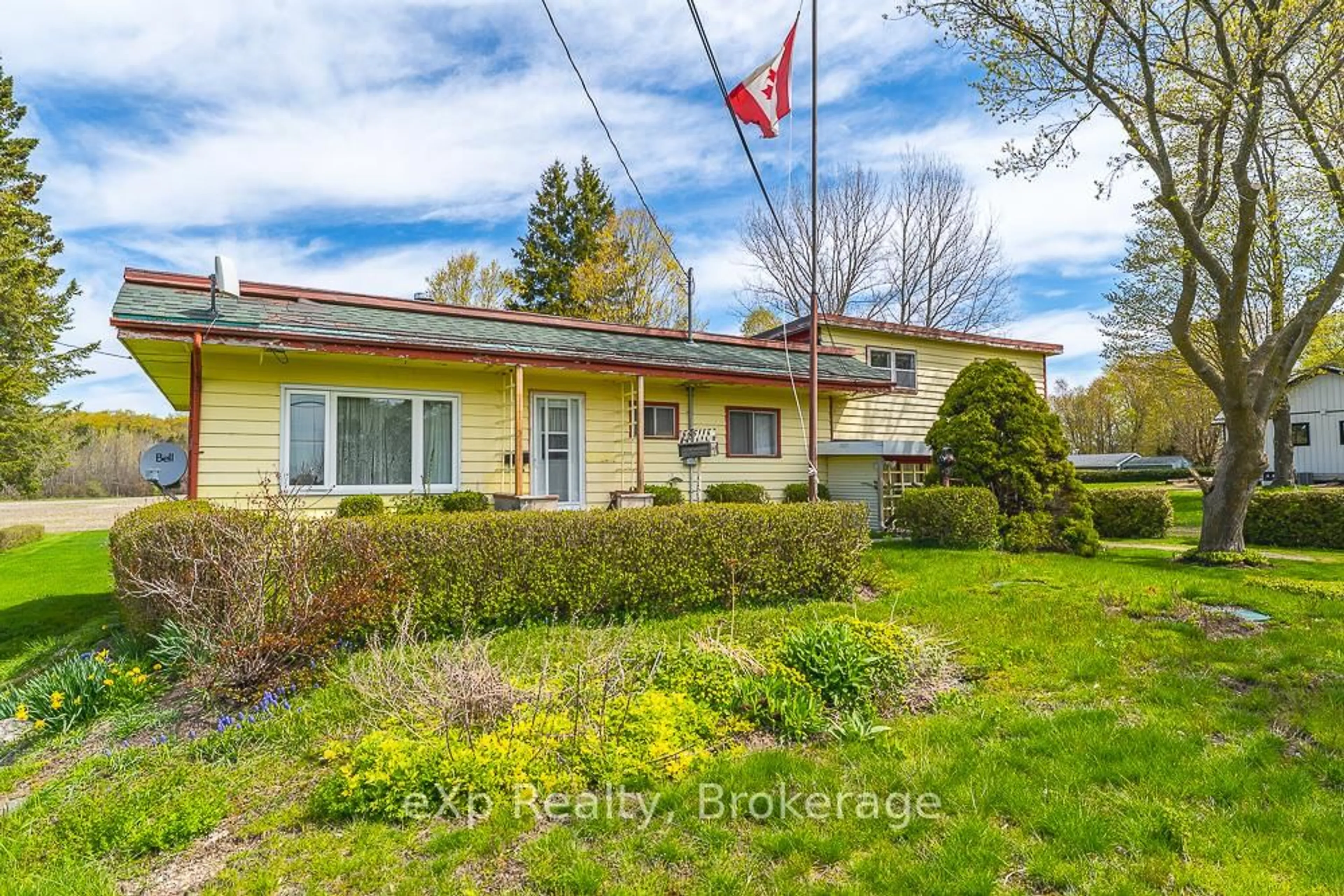 A pic from outside/outdoor area/front of a property/back of a property/a pic from drone, street for 122431 Grey County Road 5 Rd, Georgian Bluffs Ontario N4K 5N5