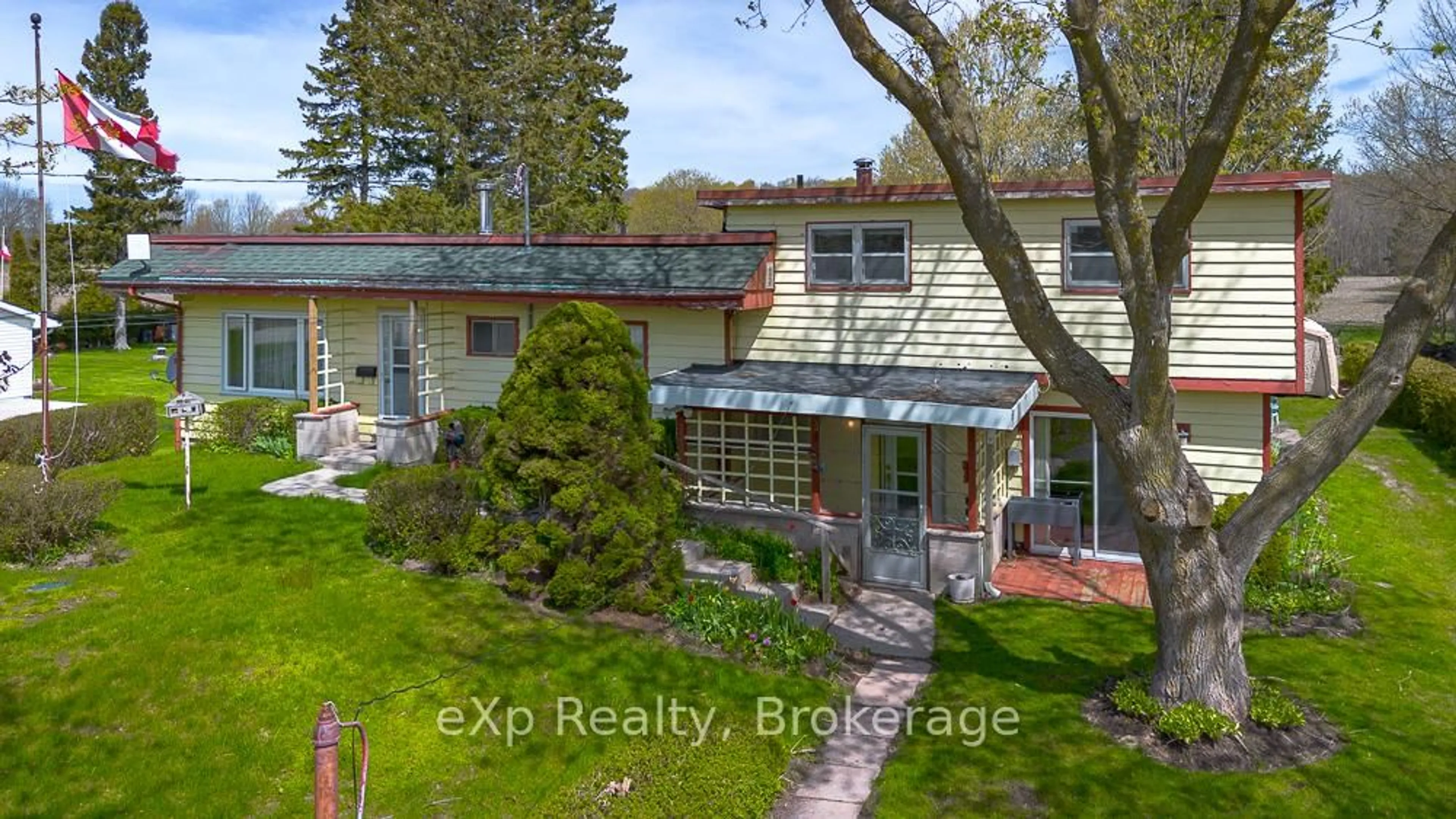 A pic from outside/outdoor area/front of a property/back of a property/a pic from drone, street for 122431 Grey County Road 5 Rd, Georgian Bluffs Ontario N4K 5N5
