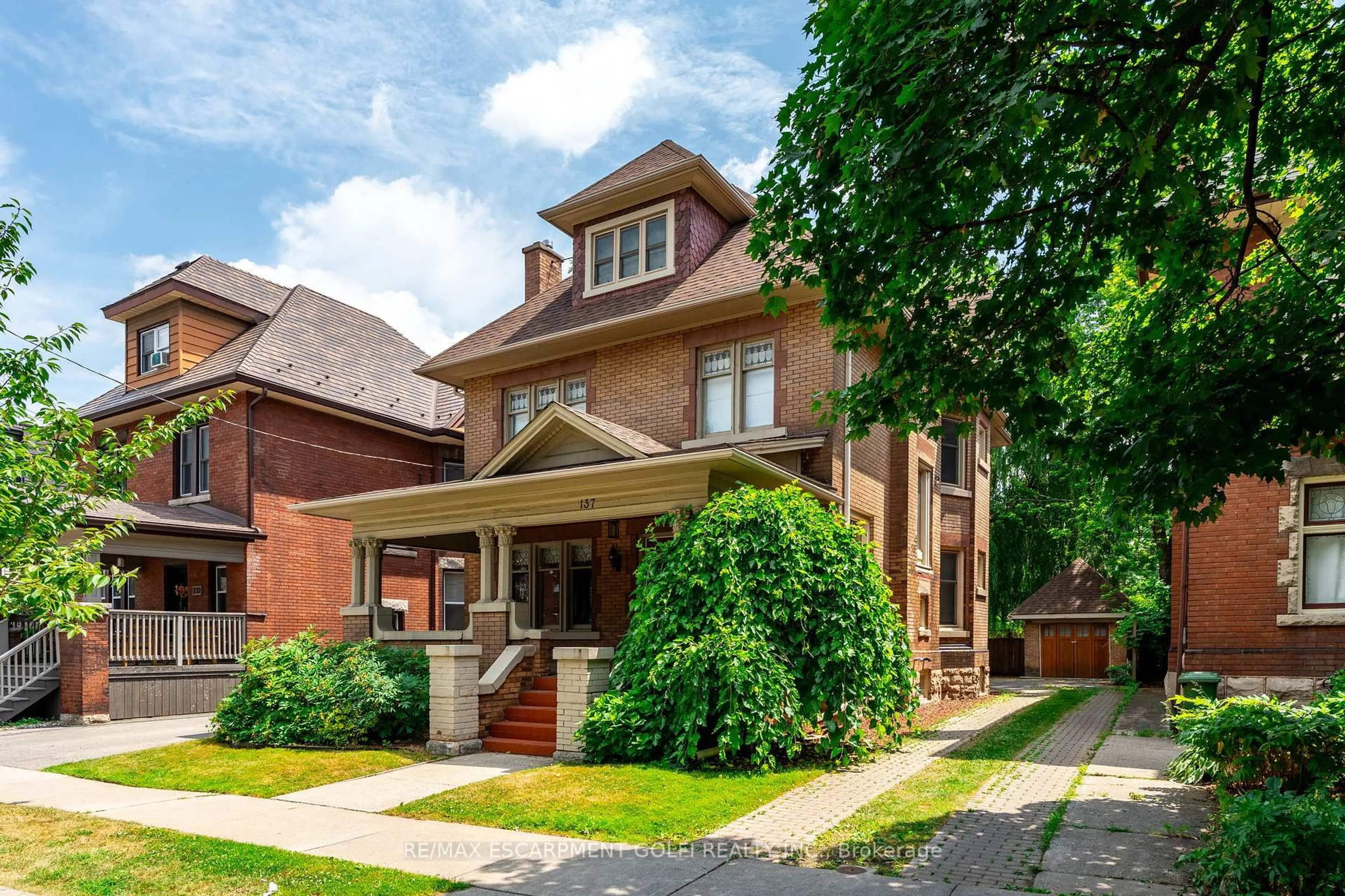 Home with brick exterior material, street for 137 Sherman Ave, Hamilton Ontario L8M 2R1