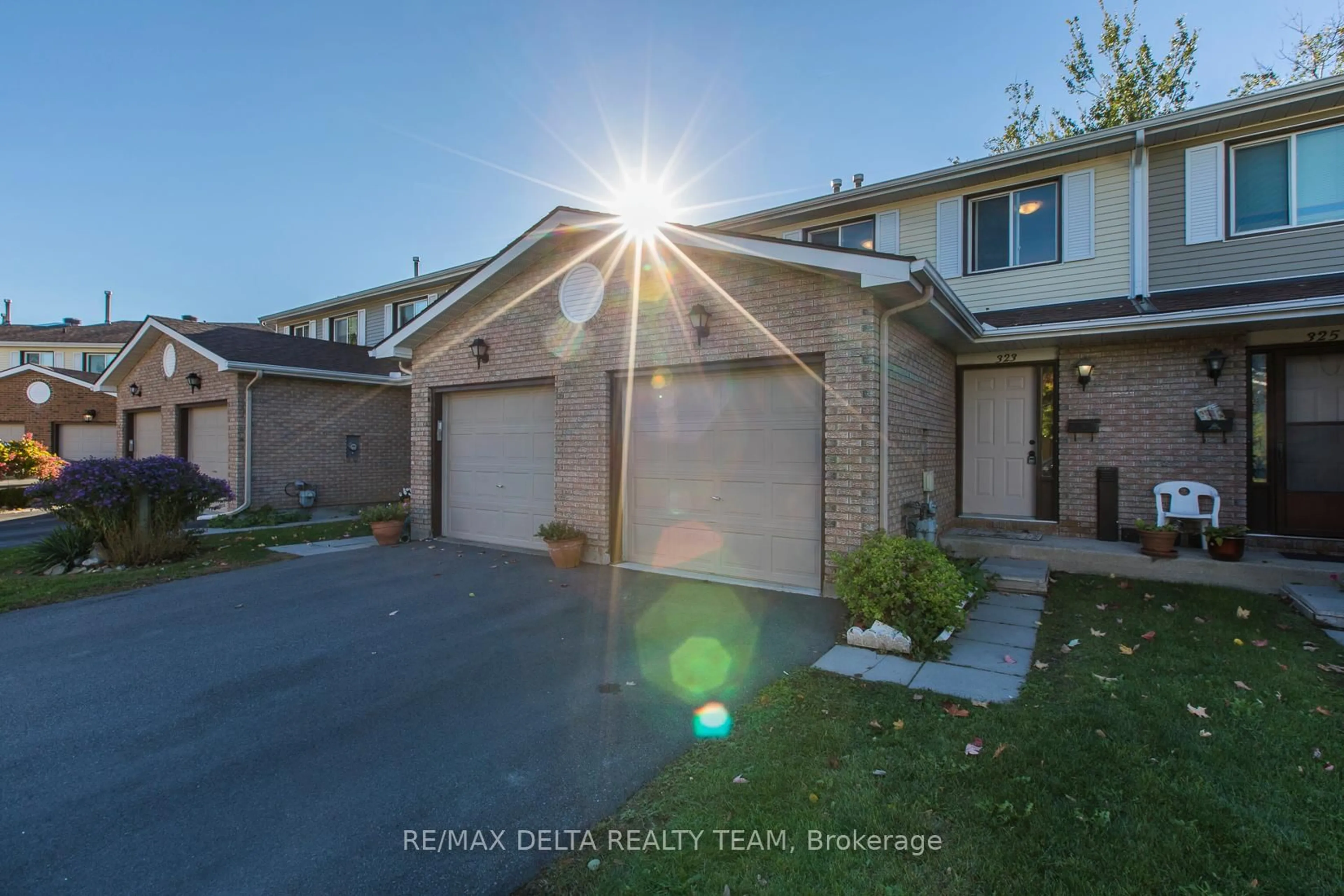 A pic from outside/outdoor area/front of a property/back of a property/a pic from drone, street for 323 Monica Cres #8, Ottawa Ontario K1E 3N6