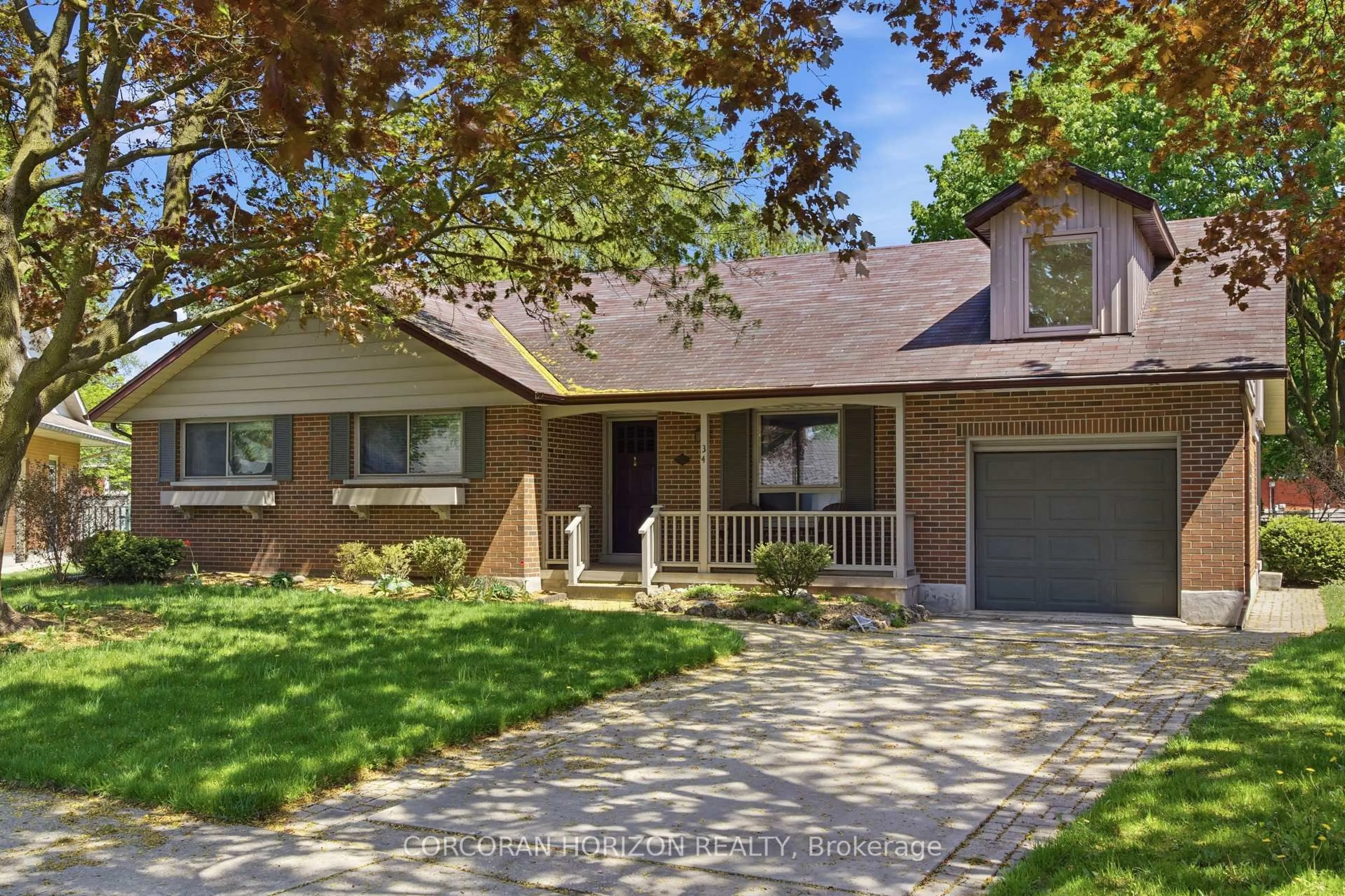 Home with brick exterior material, street for 34 Yule Pl, Kitchener Ontario N2B 2J8