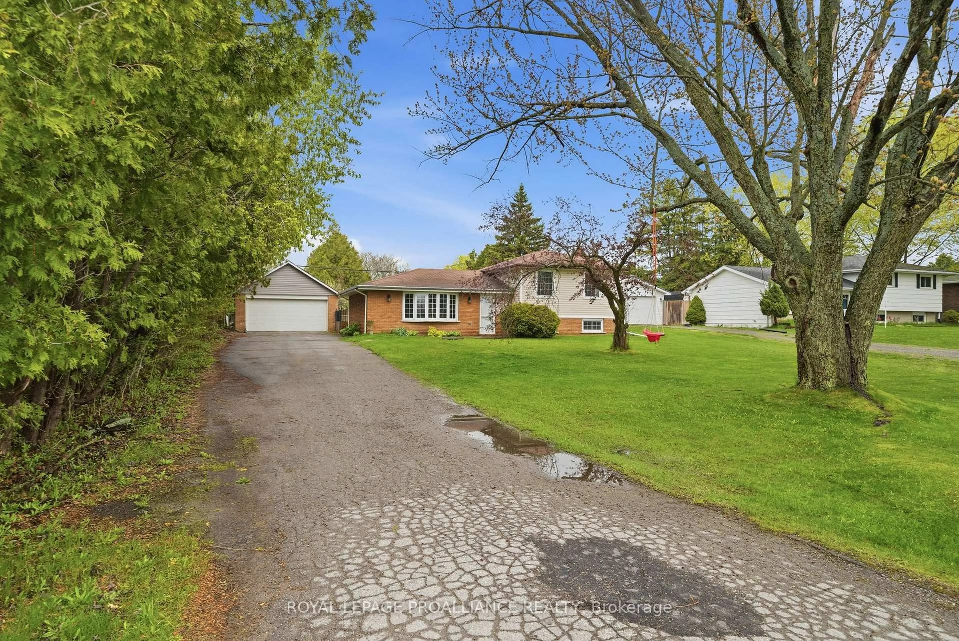 A pic from outside/outdoor area/front of a property/back of a property/a pic from drone, street for 584 Whites Rd, Trenton Ontario K8V 5P8
