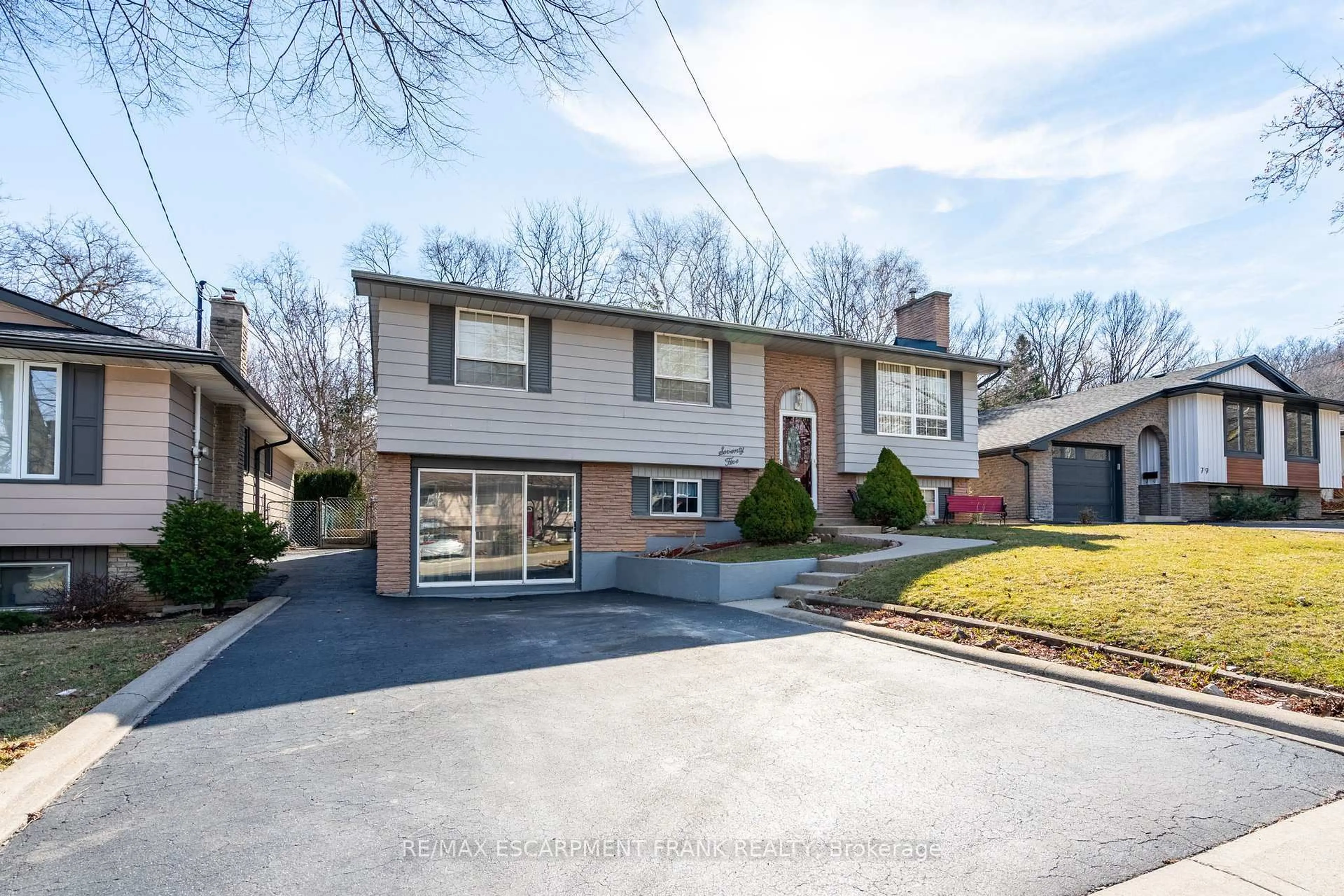 Home with brick exterior material, street for 75 Hanover Pl, Hamilton Ontario L8K 5X7