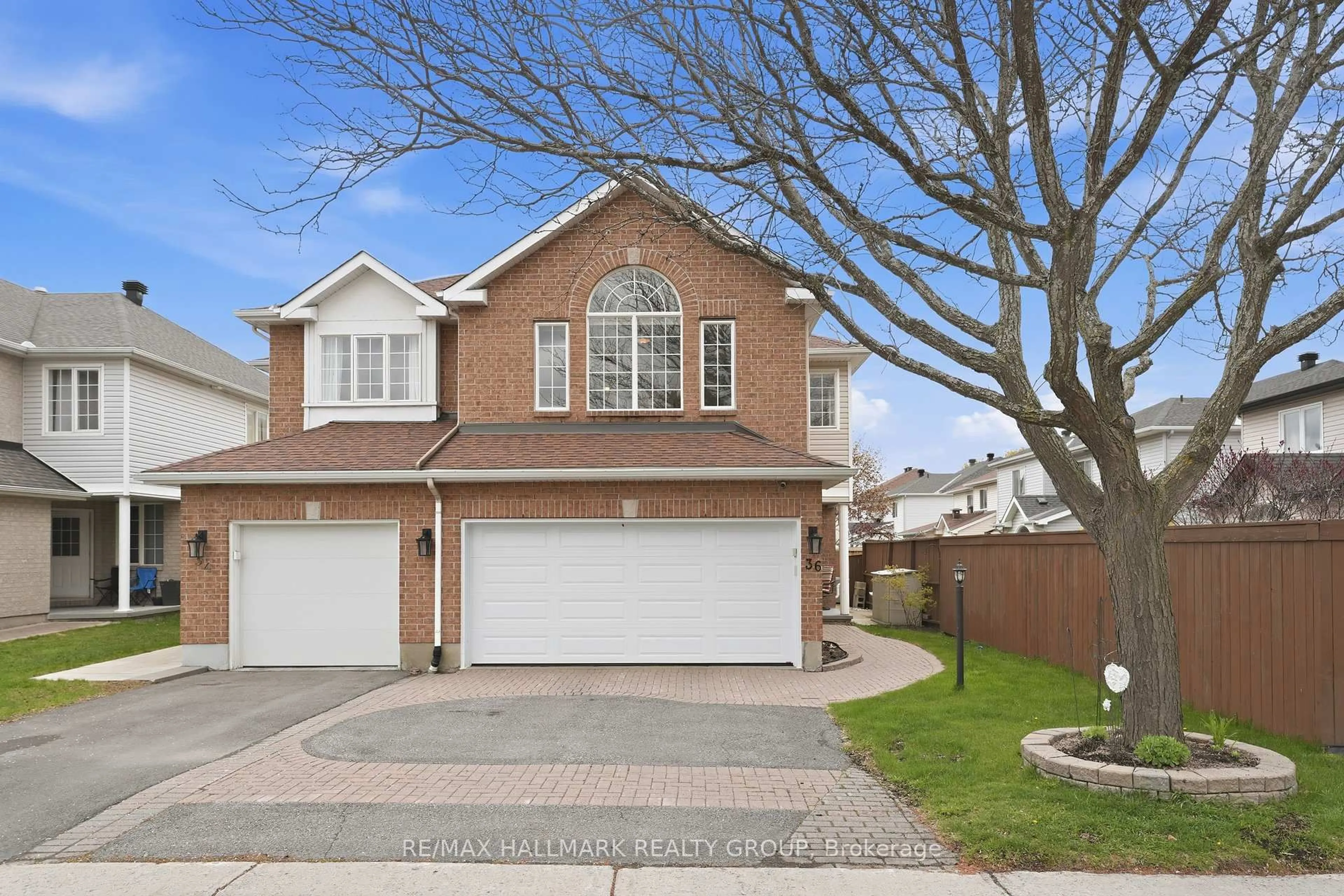 Home with brick exterior material, street for 36 Palmadeo Dr, Ottawa Ontario K2J 5A2