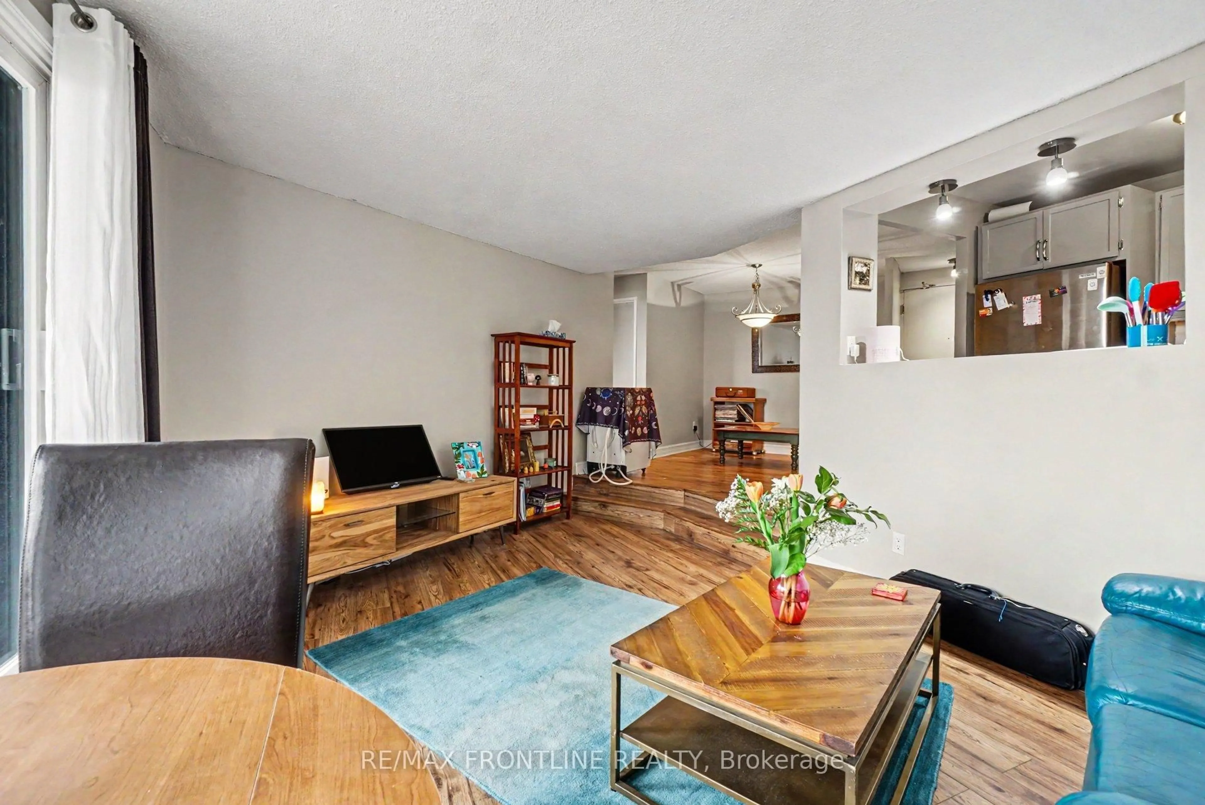 Living room with furniture, unknown for 1081 Ambleside Dr #1009, Ottawa Ontario K2B 8C8