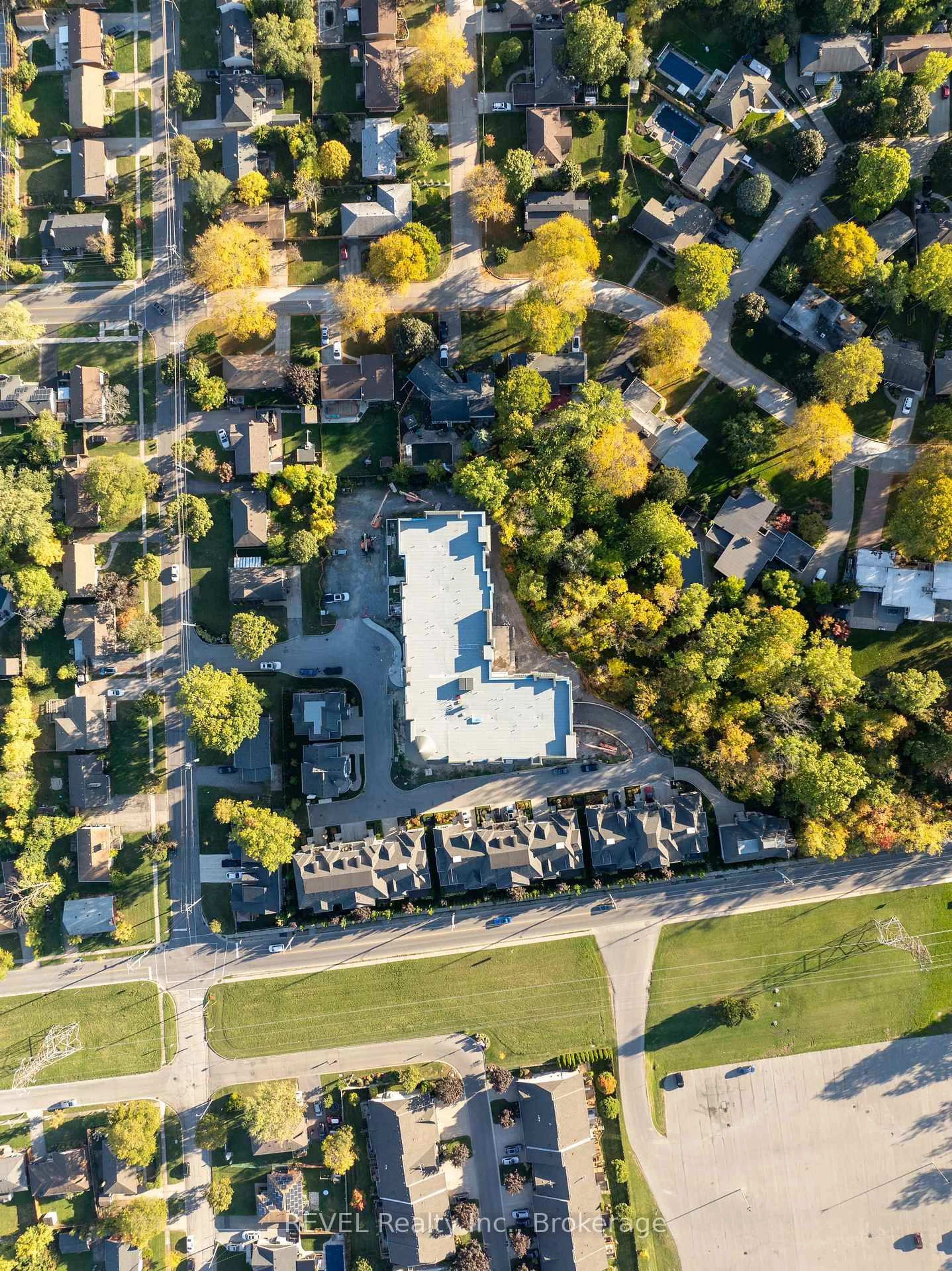 A pic from outside/outdoor area/front of a property/back of a property/a pic from drone, street for 2 Arbourvale Common #410, St. Catharines Ontario L2T 2Z9
