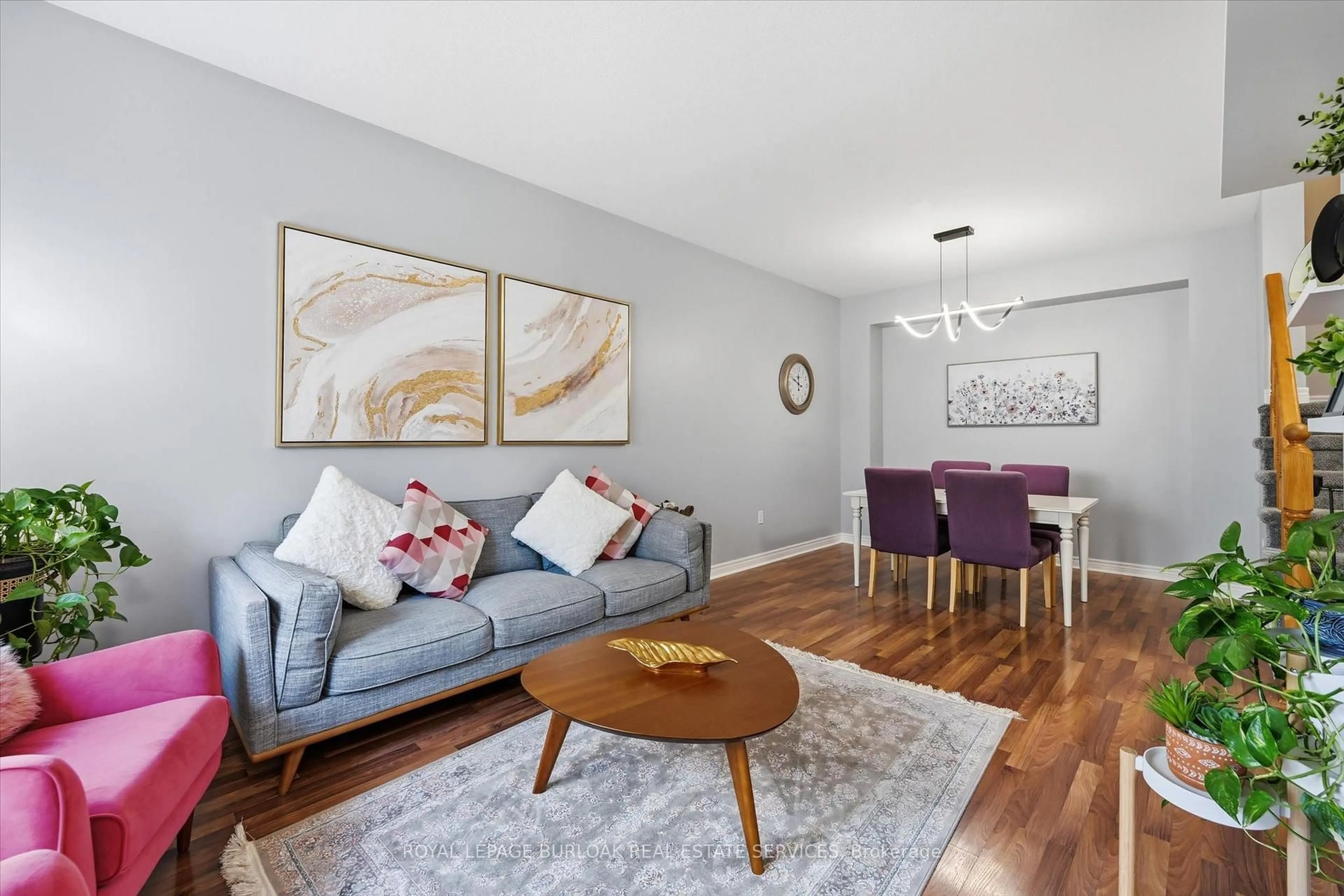 Living room with furniture, wood/laminate floor for 1085 Harrogate Dr #35, Hamilton Ontario L9K 1R2