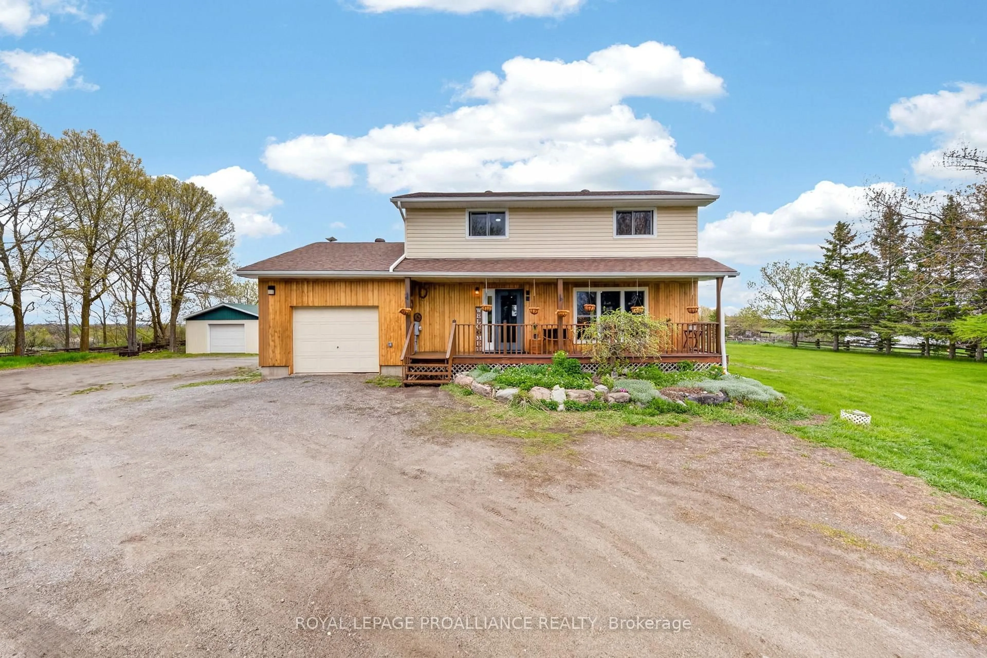 A pic from outside/outdoor area/front of a property/back of a property/a pic from drone, street for 235 East Hungerford Rd, Tweed Ontario K0K 3J0