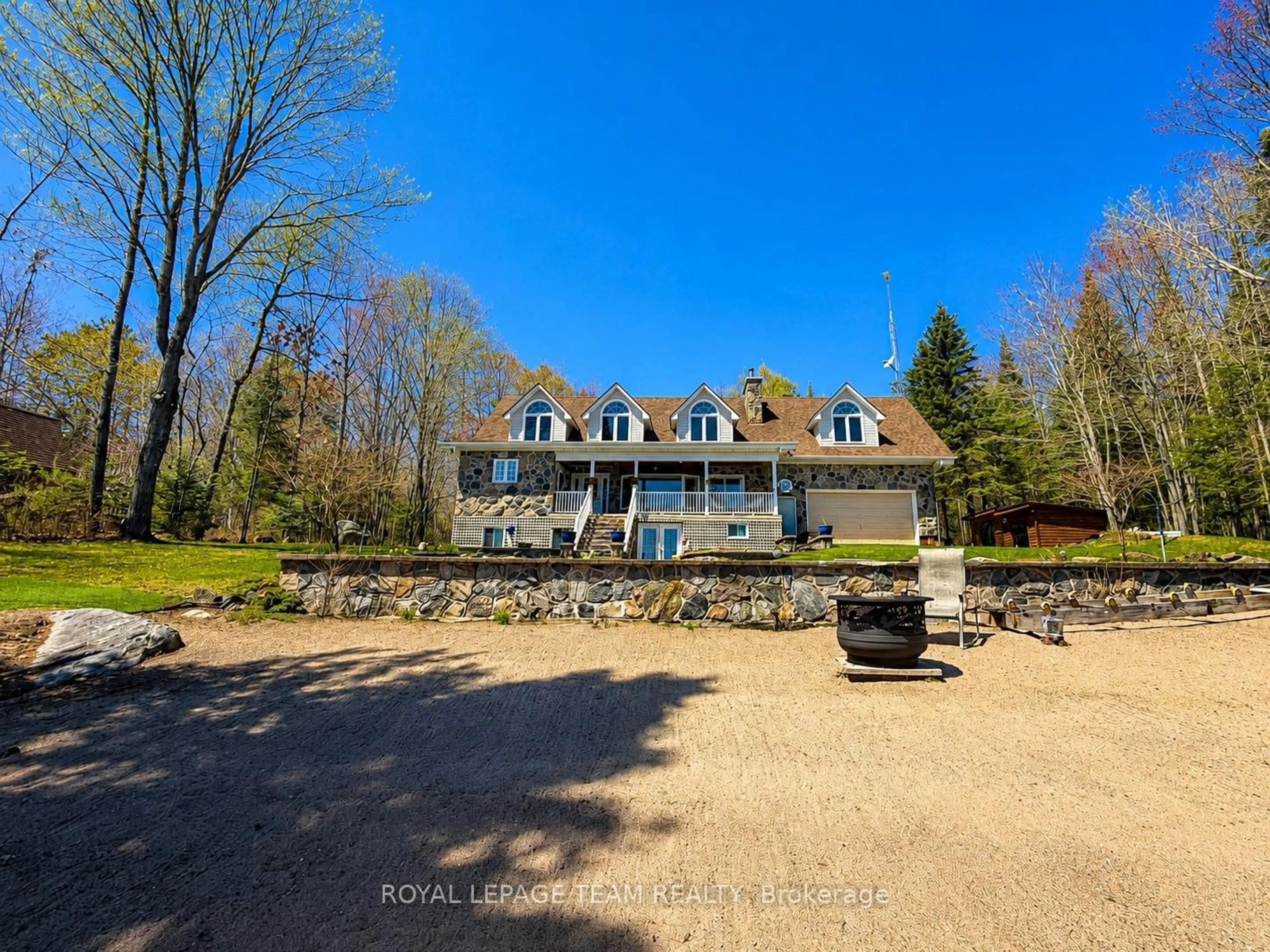A pic from outside/outdoor area/front of a property/back of a property/a pic from drone, water/lake/river/ocean view for 1324A River Rd, Barry's Bay Ontario K0J 1B0