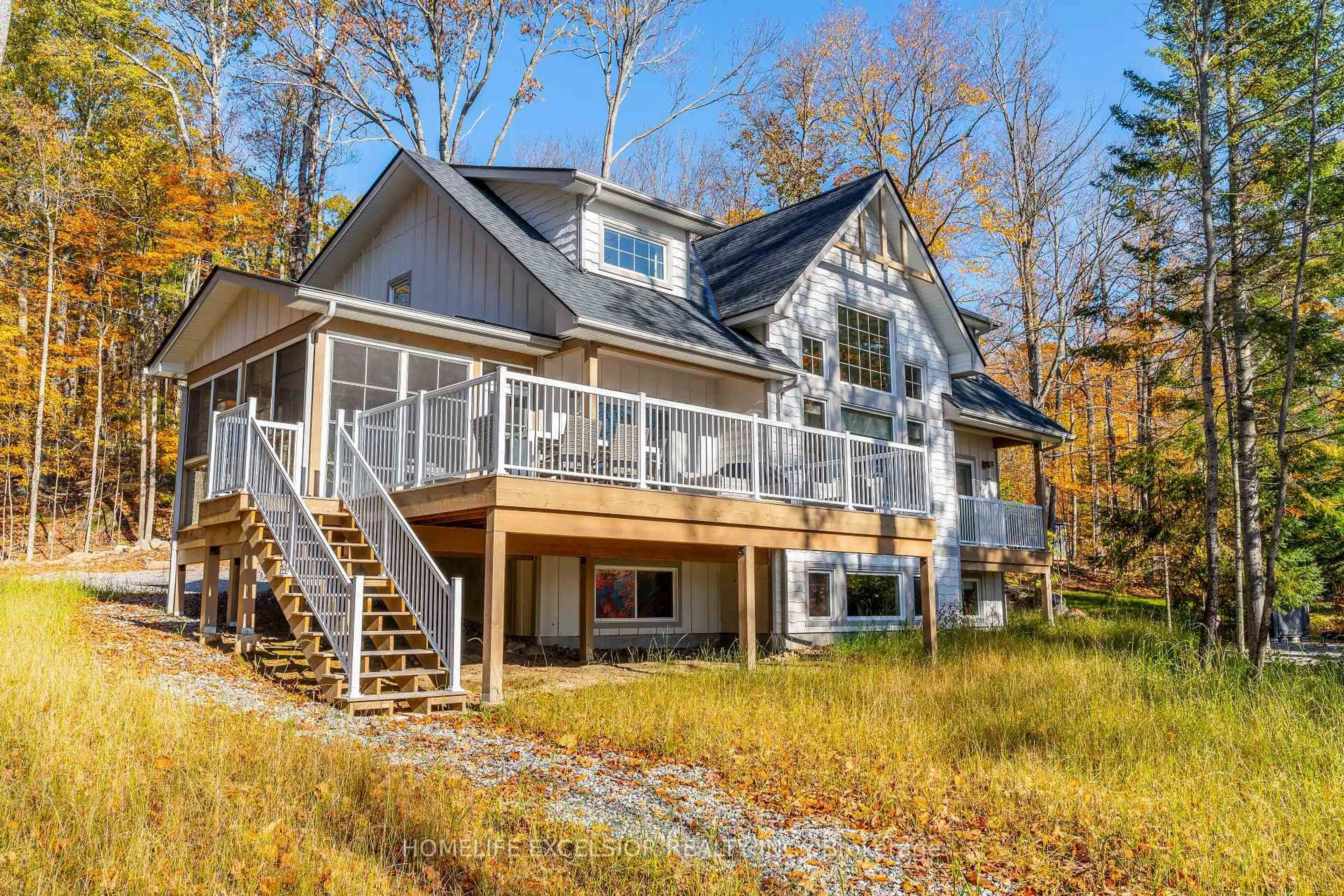 Home with vinyl exterior material, water/lake/river/ocean view for 1284 True North Rd, Dysart et al Ontario K0M 2T0