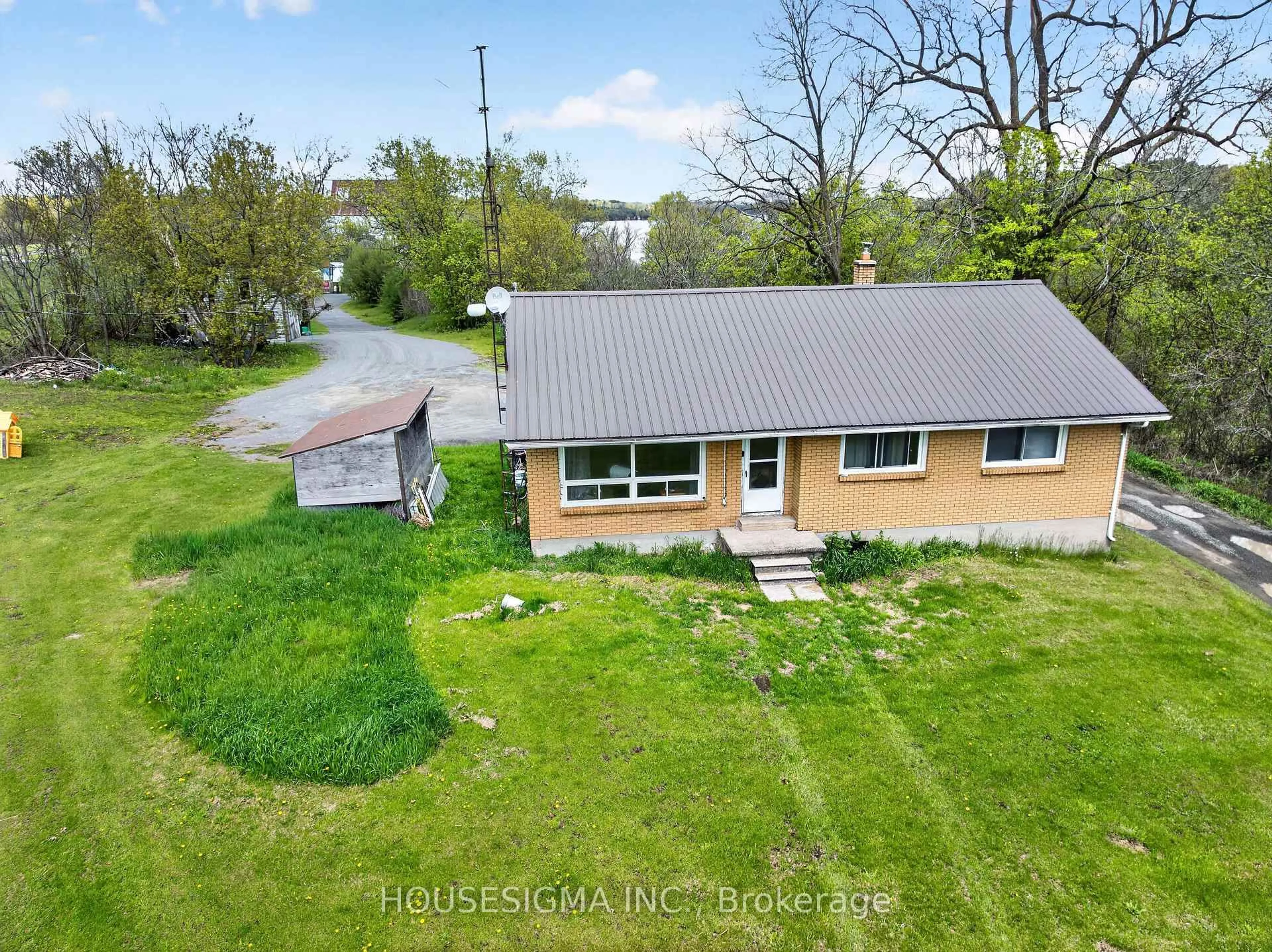 A pic from outside/outdoor area/front of a property/back of a property/a pic from drone, water/lake/river/ocean view for 2418-2420 Rutledge Rd, Sydenham Ontario K0H 2T0