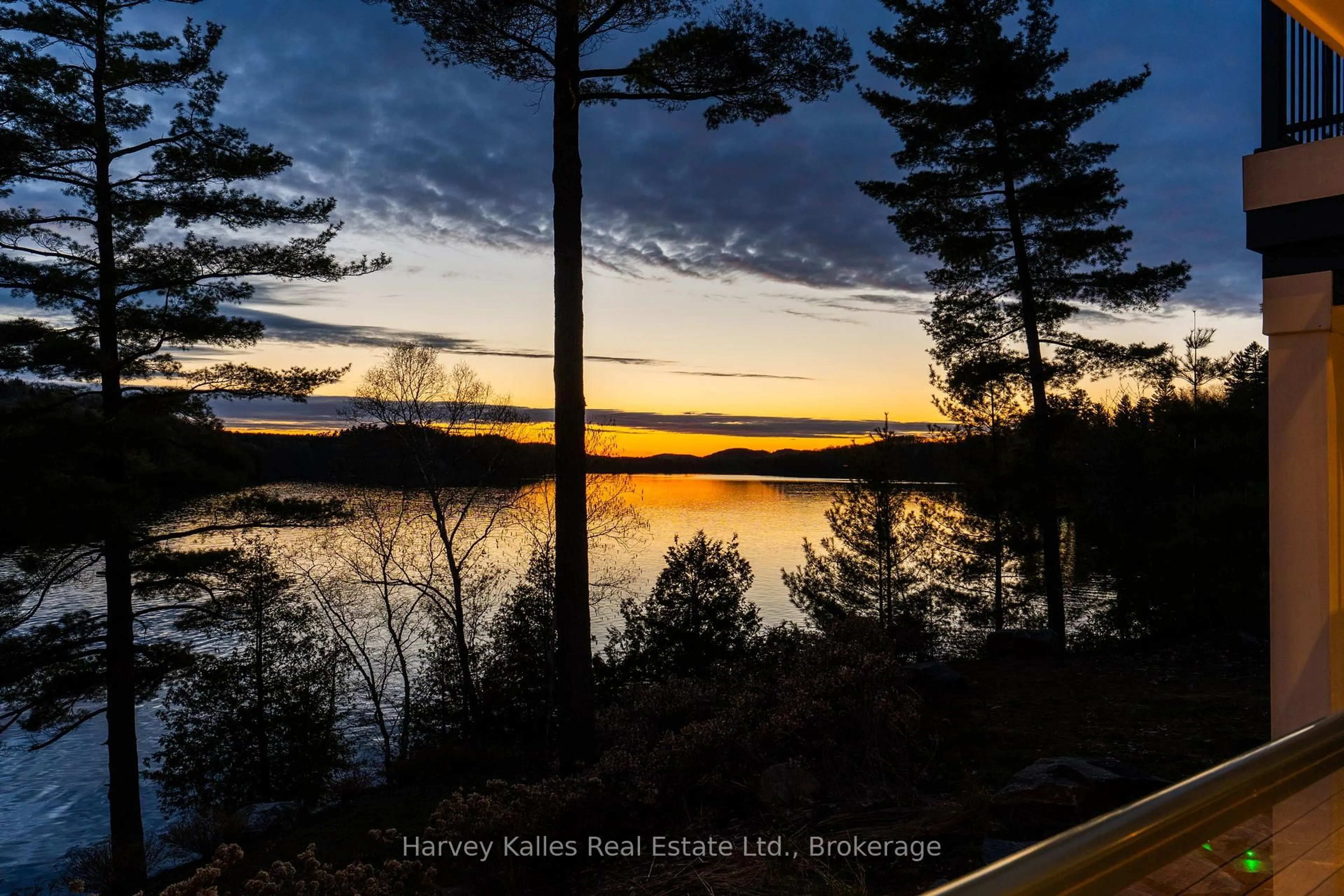 A pic from outside/outdoor area/front of a property/back of a property/a pic from drone, water/lake/river/ocean view for 800 Big Island, Huntsville Ontario P1H 2J2