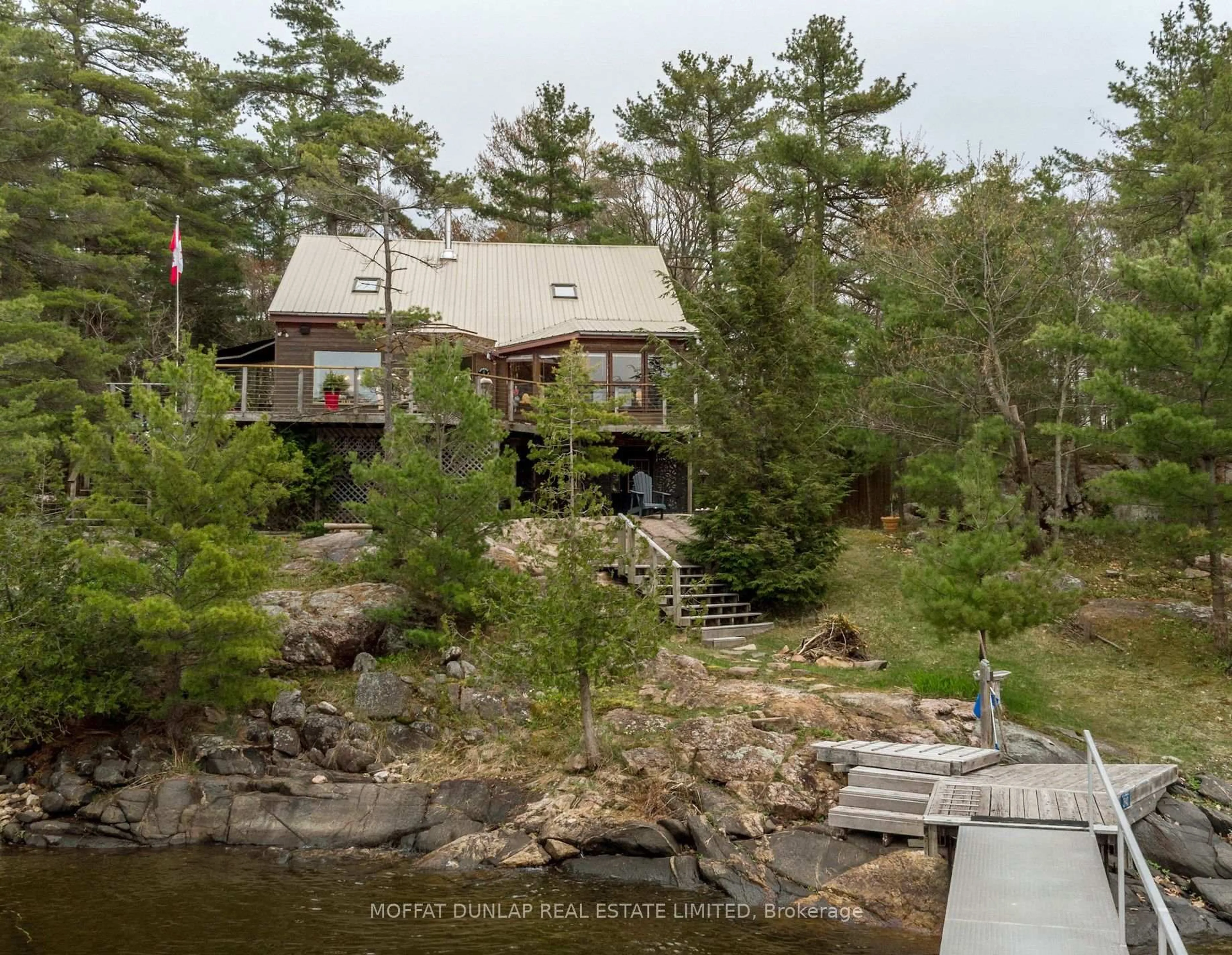 A pic from outside/outdoor area/front of a property/back of a property/a pic from drone, water/lake/river/ocean view for 3888 Island 820/Mermaid Island, Georgian Bay Ontario P0E 1E0