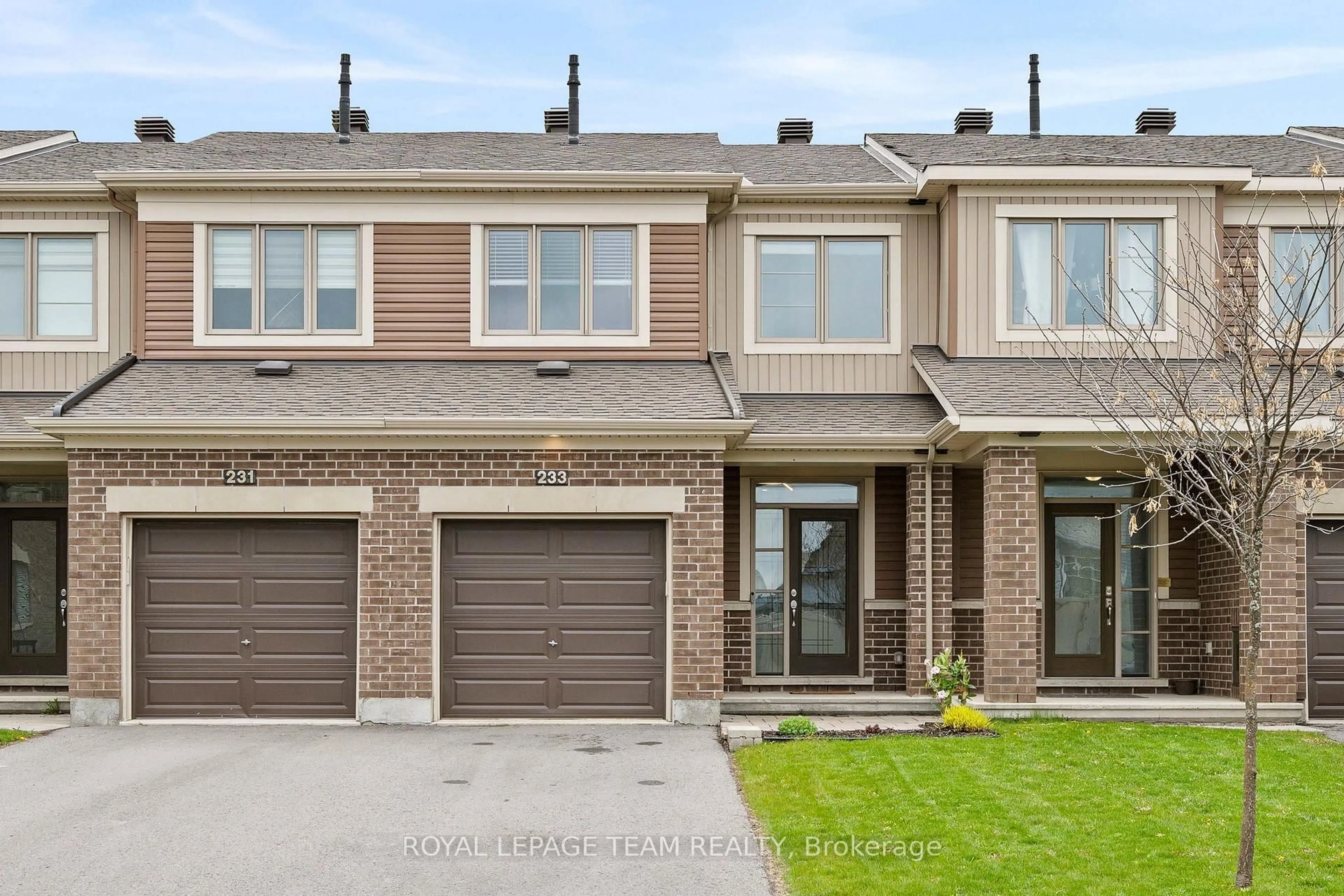 Home with brick exterior material, street for 233 Mountain Sorrel Way, Orleans Ontario K4A 1H3