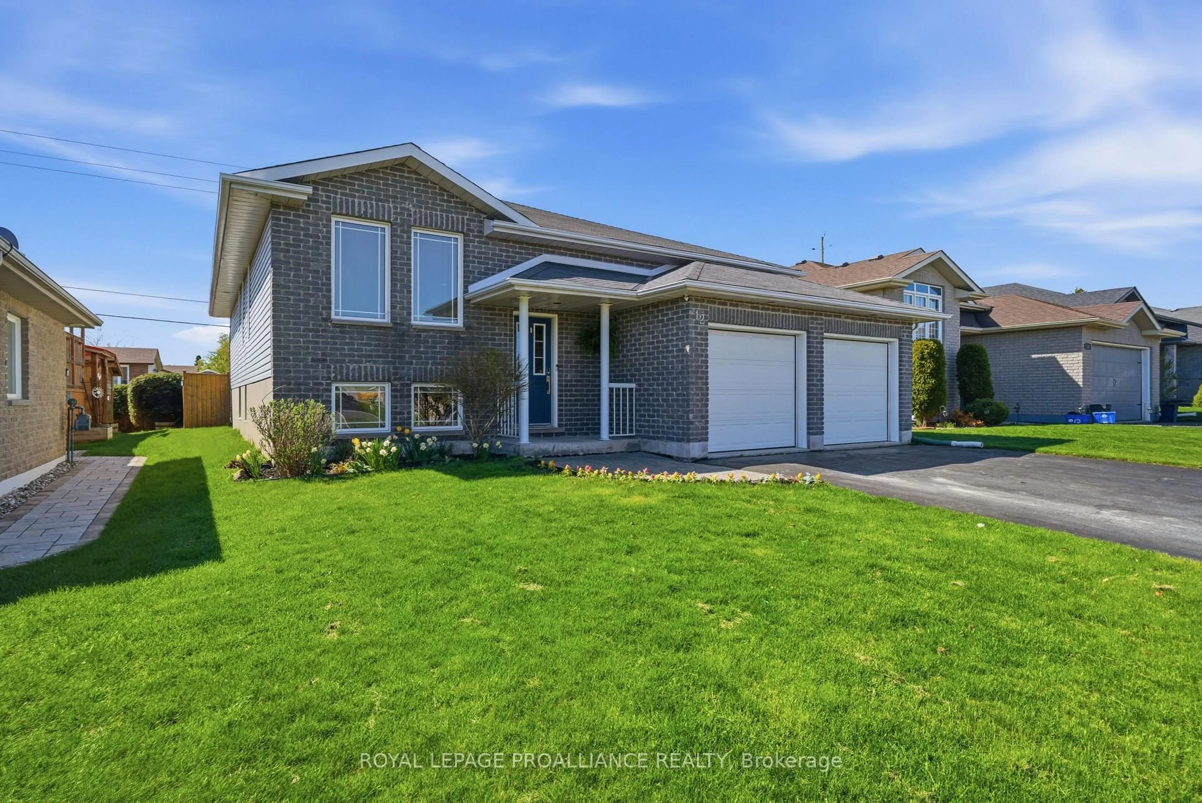 Home with vinyl exterior material, street for 12 Ridgeview Lane, Trenton Ontario K8V 5P8