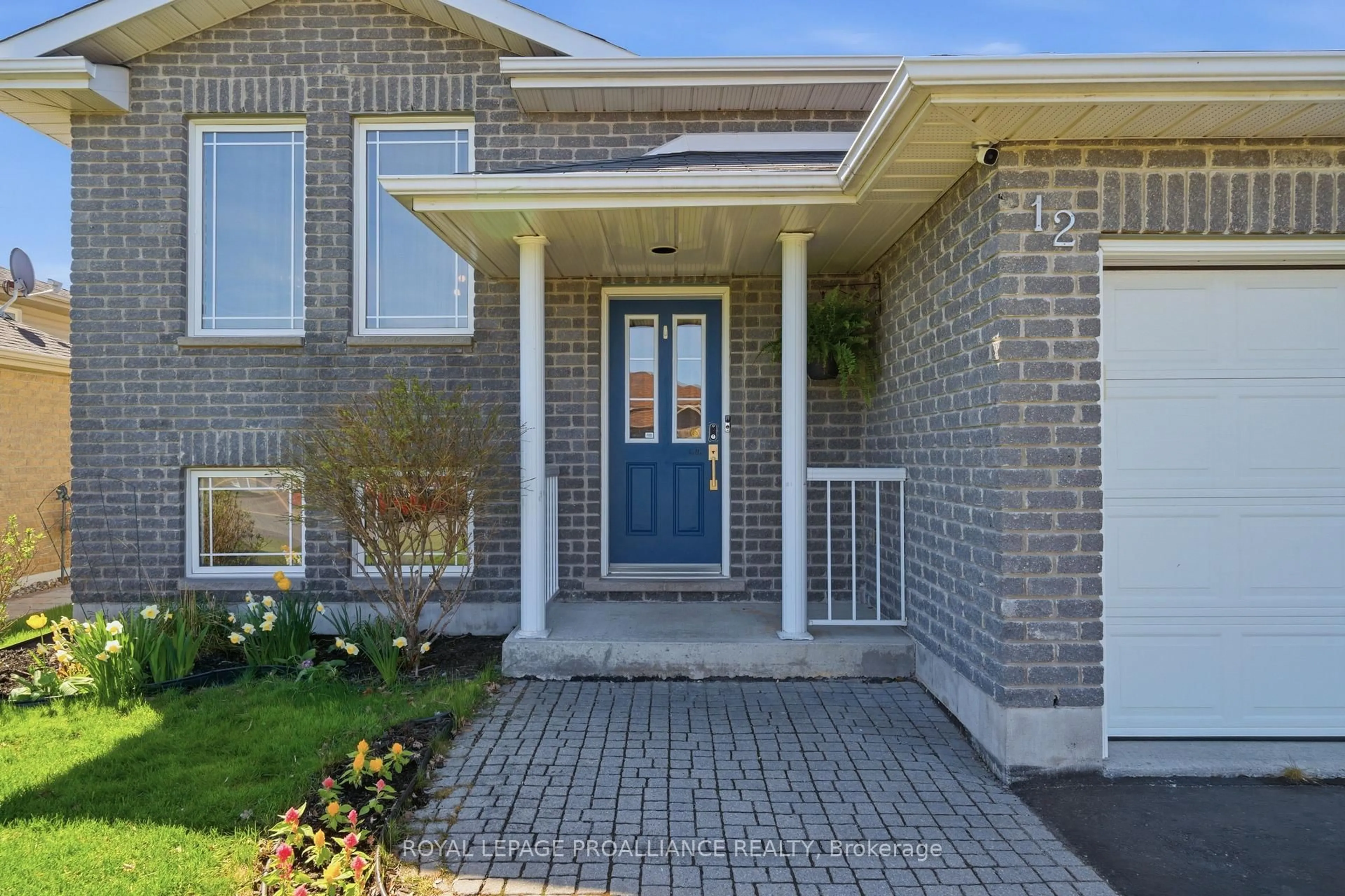 Home with brick exterior material, street for 12 Ridgeview Lane, Trenton Ontario K8V 5P8