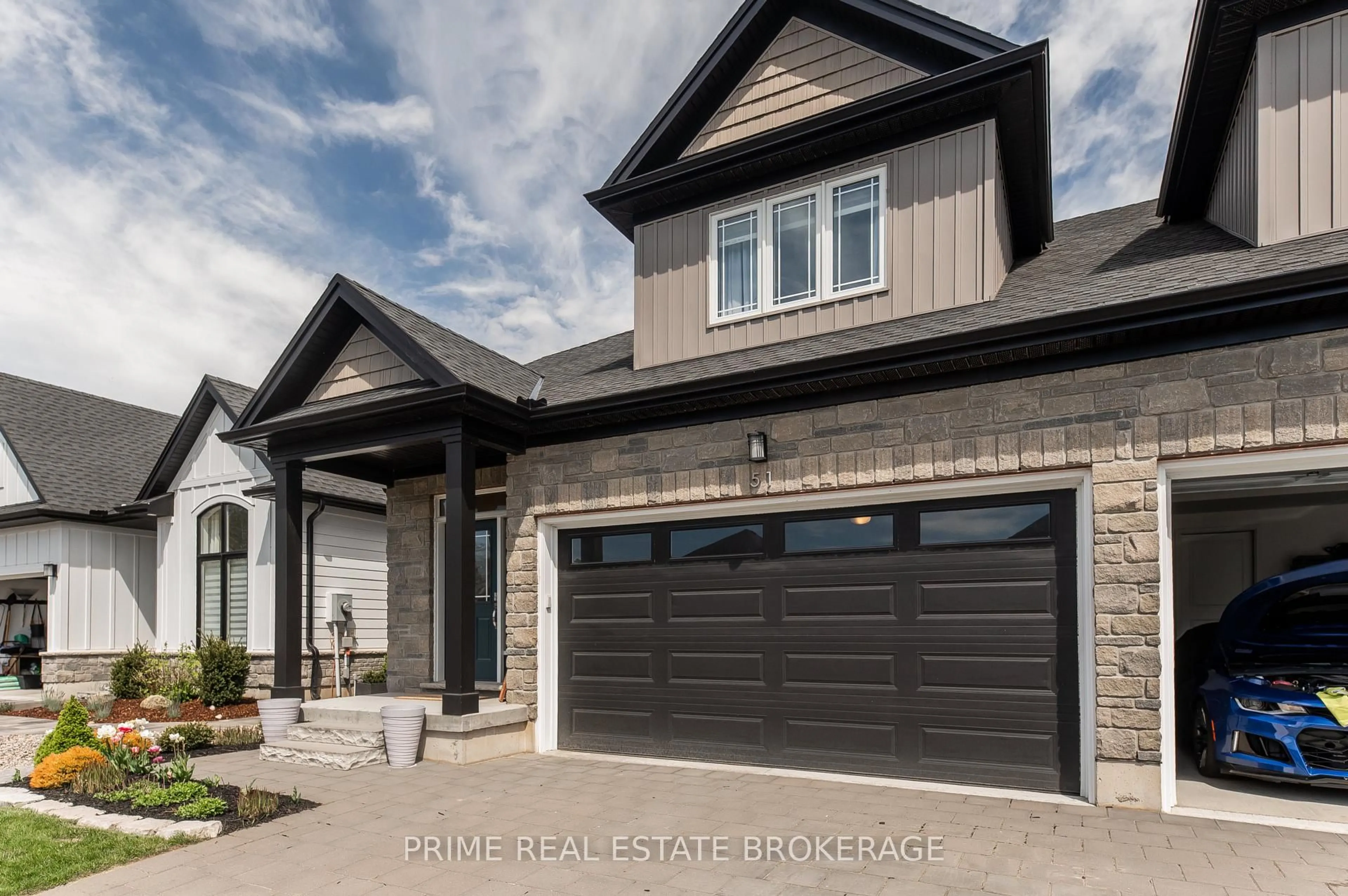 Home with brick exterior material, street for 51 Compass Tr, Central Elgin Ontario L5G 4T8