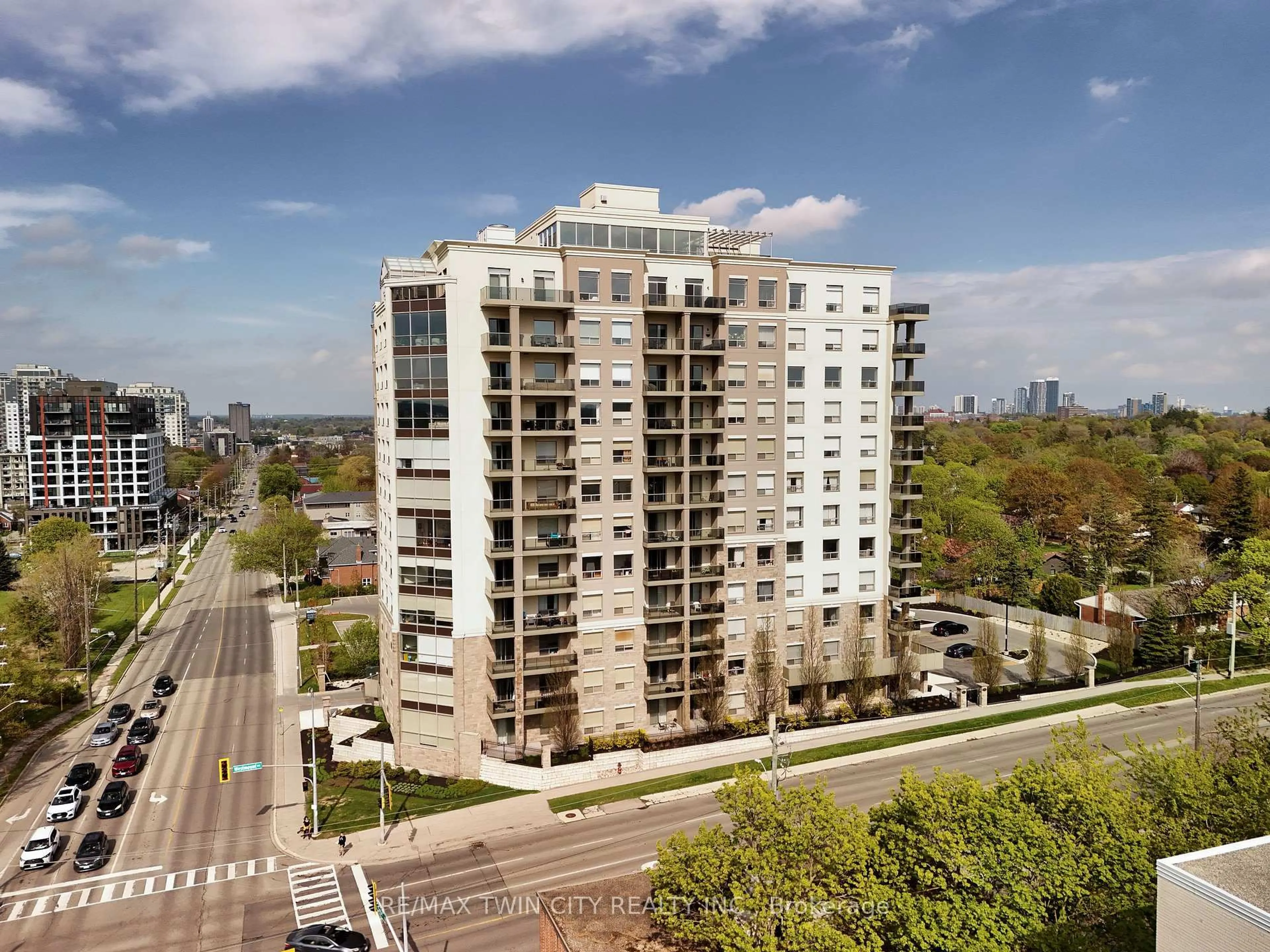 A pic from outside/outdoor area/front of a property/back of a property/a pic from drone, city buildings view from balcony for 223 Erb St #405, Waterloo Ontario N2L 0B3