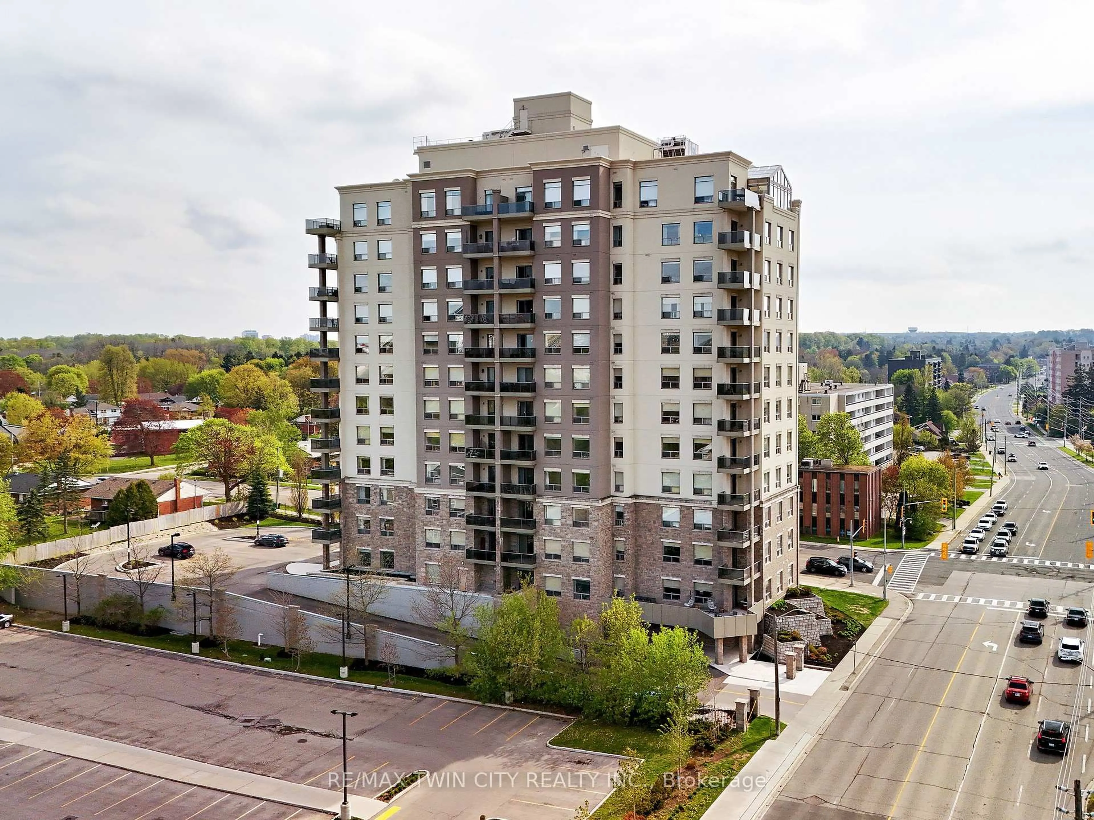 A pic from outside/outdoor area/front of a property/back of a property/a pic from drone, city buildings view from balcony for 223 Erb St #405, Waterloo Ontario N2L 0B3