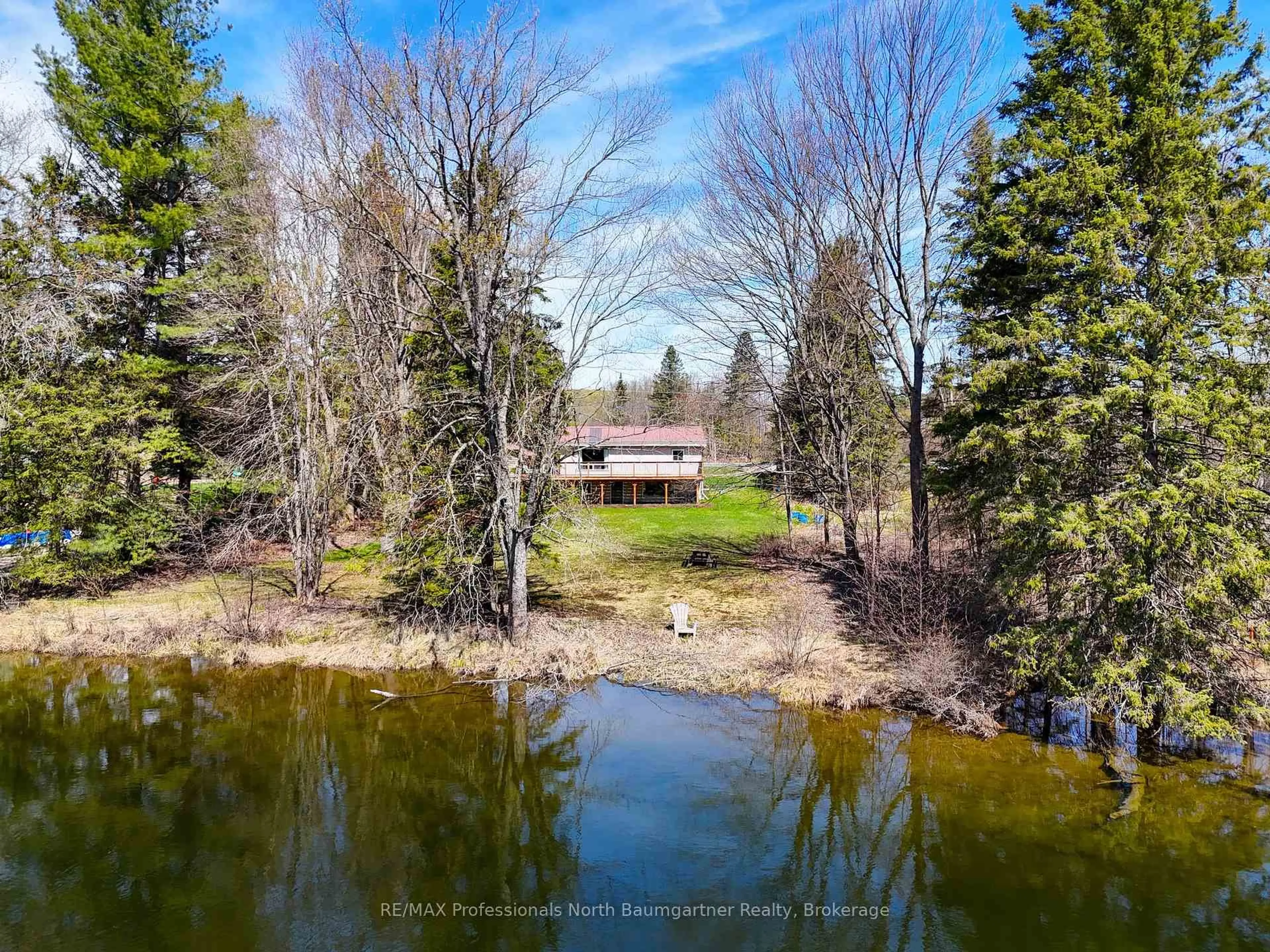 A pic from outside/outdoor area/front of a property/back of a property/a pic from drone, water/lake/river/ocean view for 4112 Deep Bay Rd, Minden Hills Ontario K0M 2K0