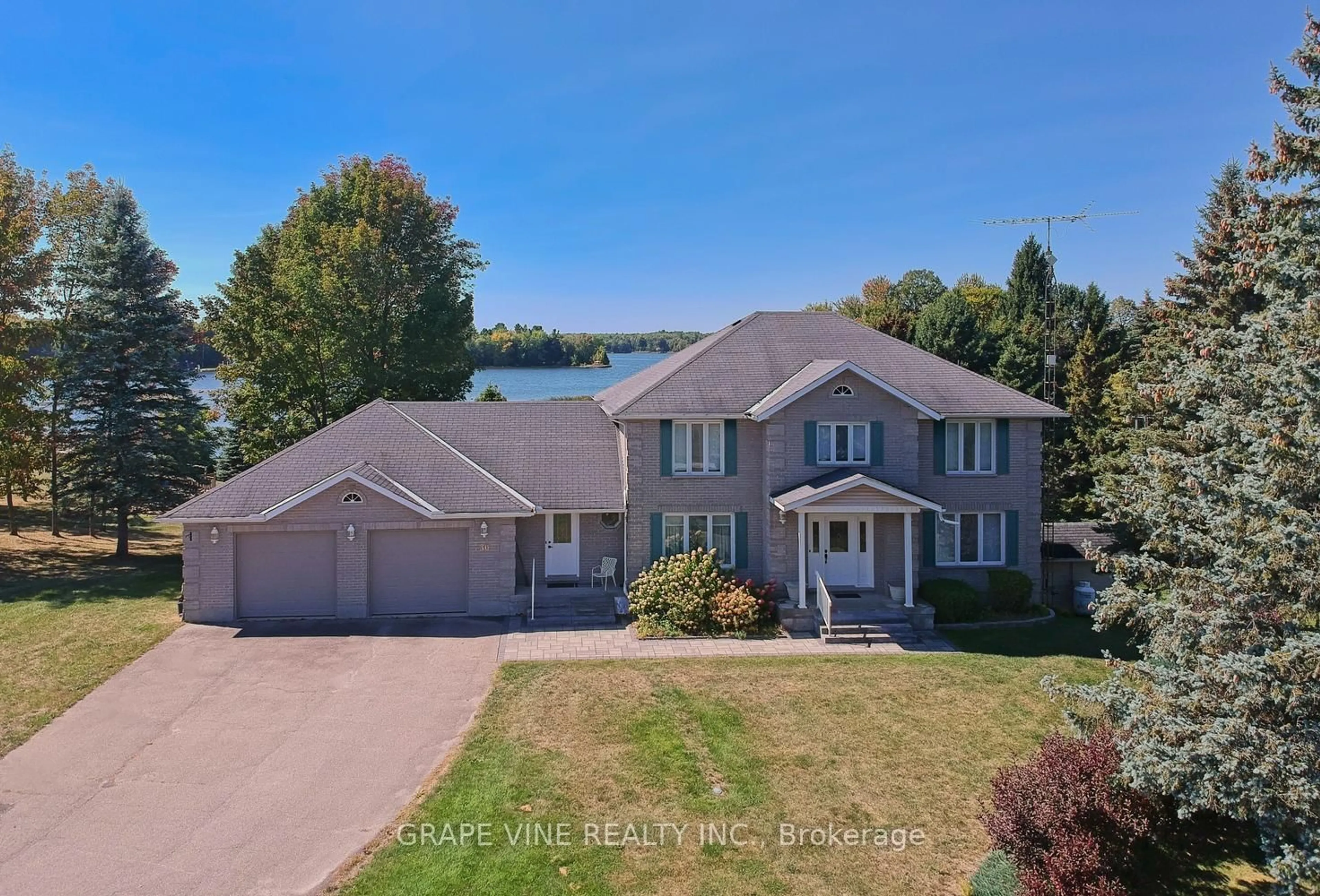 A pic from outside/outdoor area/front of a property/back of a property/a pic from drone, water/lake/river/ocean view for 30 R14, RR#1 Rd, Rideau Lakes Ontario K0G 1L0
