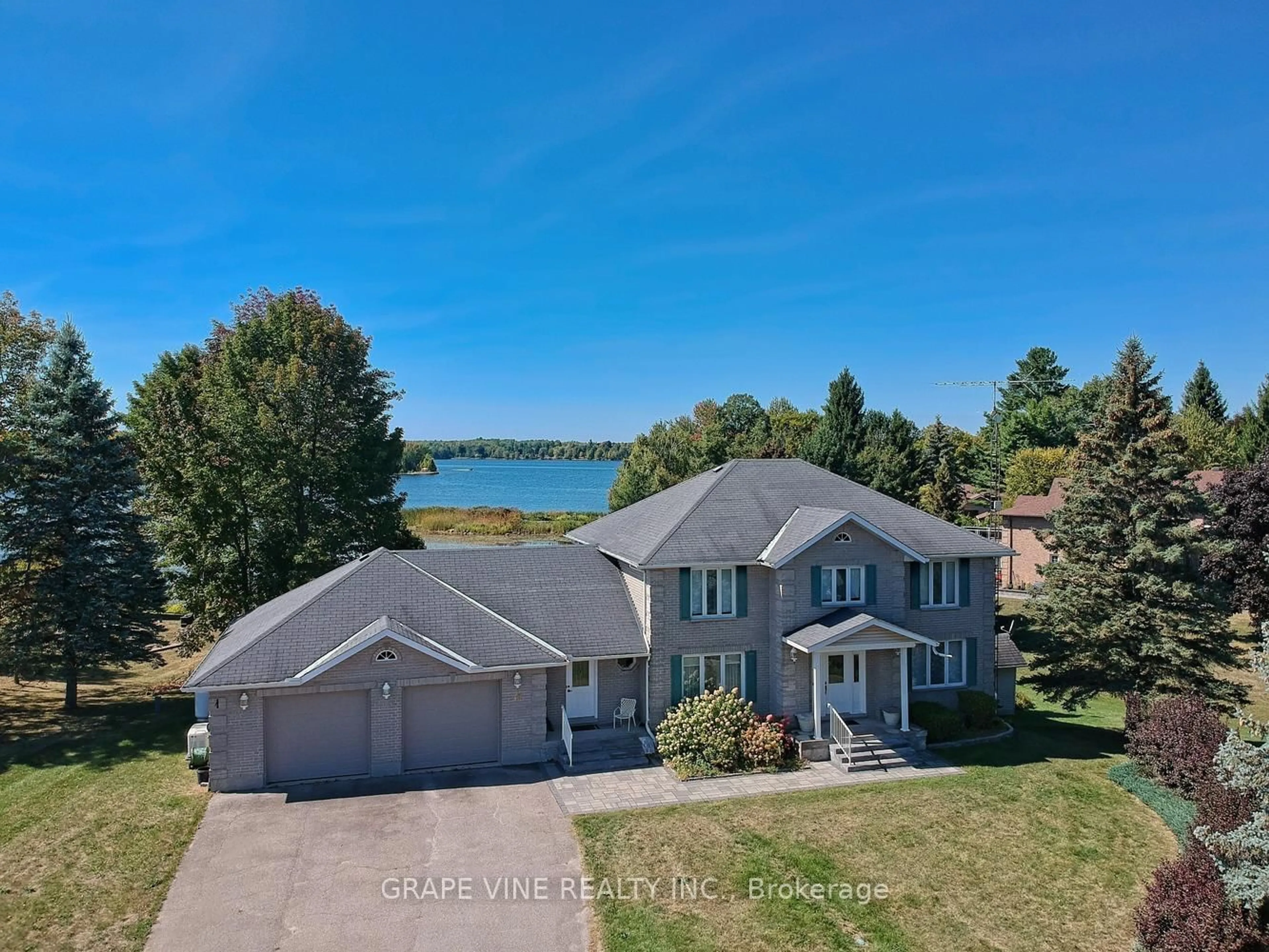 A pic from outside/outdoor area/front of a property/back of a property/a pic from drone, water/lake/river/ocean view for 30 R14, RR#1 Rd, Rideau Lakes Ontario K0G 1L0