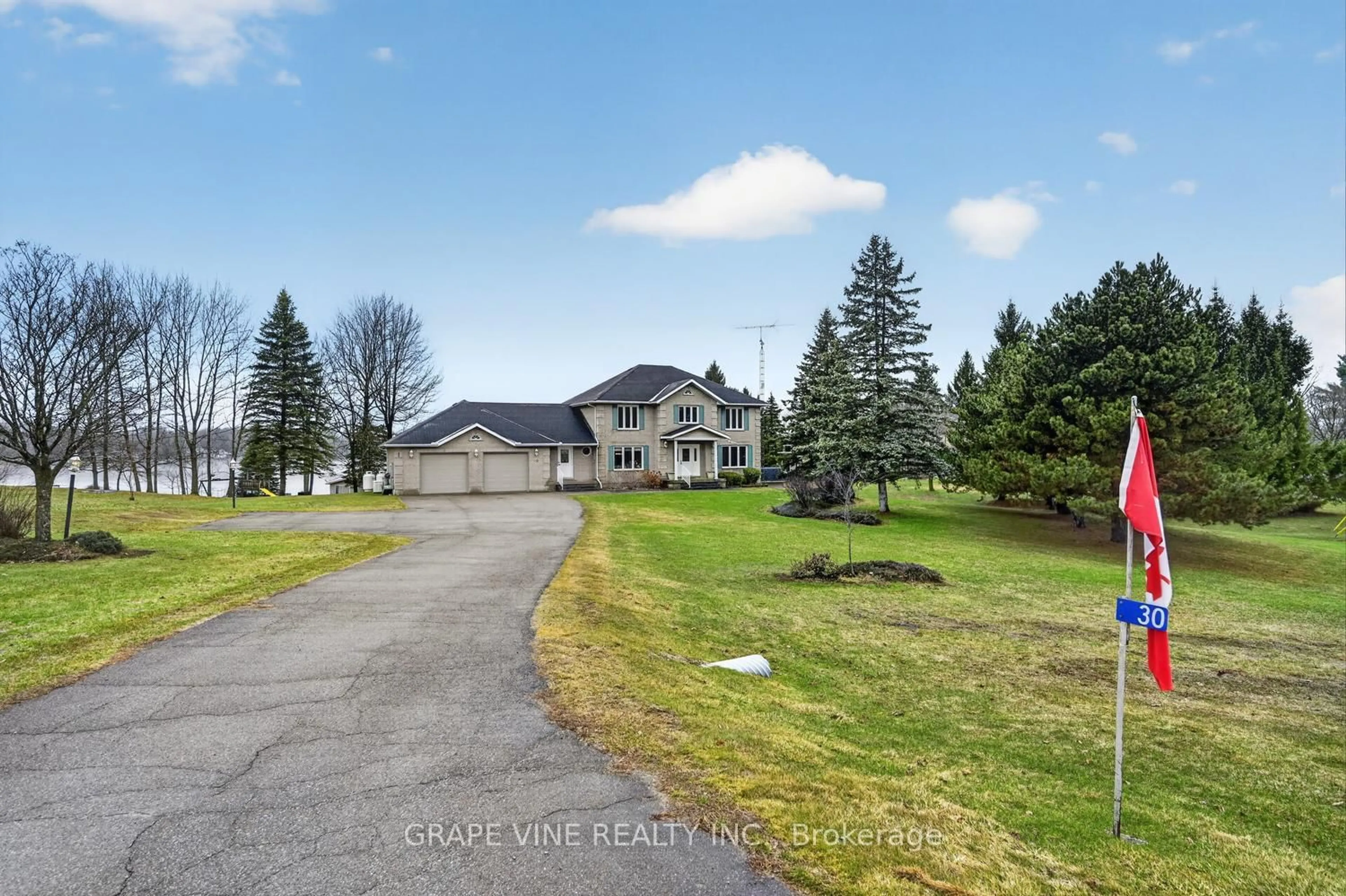 A pic from outside/outdoor area/front of a property/back of a property/a pic from drone, water/lake/river/ocean view for 30 R14, RR#1 Rd, Rideau Lakes Ontario K0G 1L0