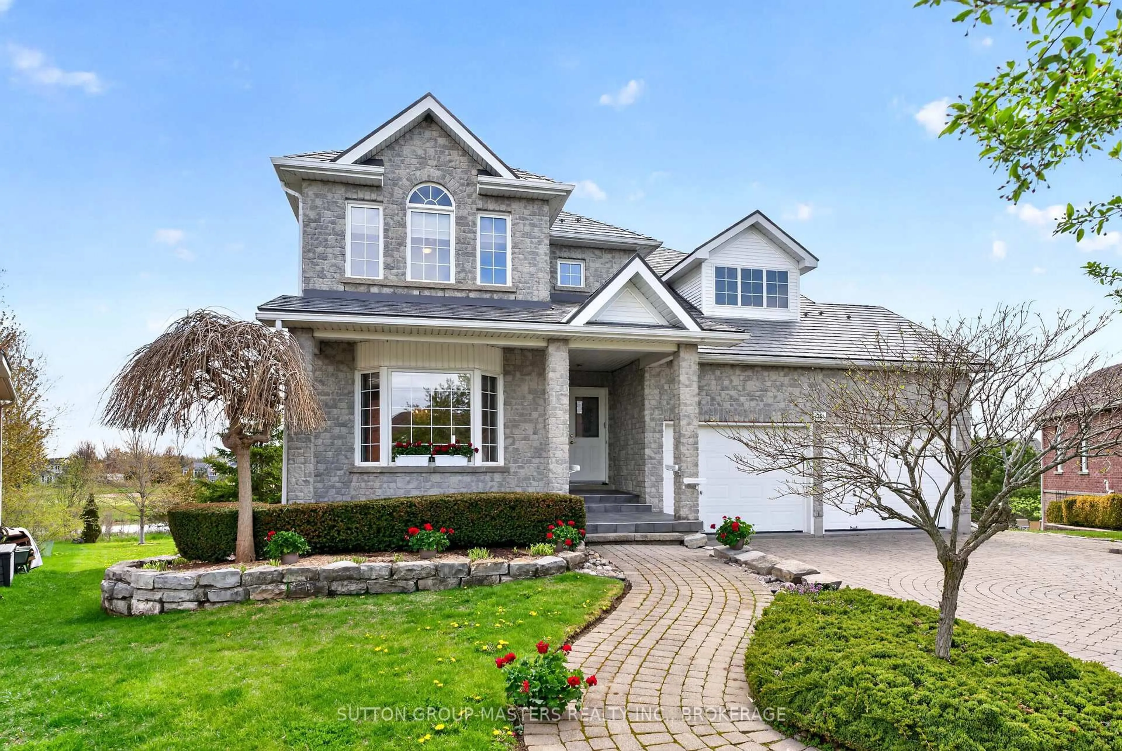 Home with brick exterior material, street for 36 Glenora Dr, Bath Ontario K0H 1G0