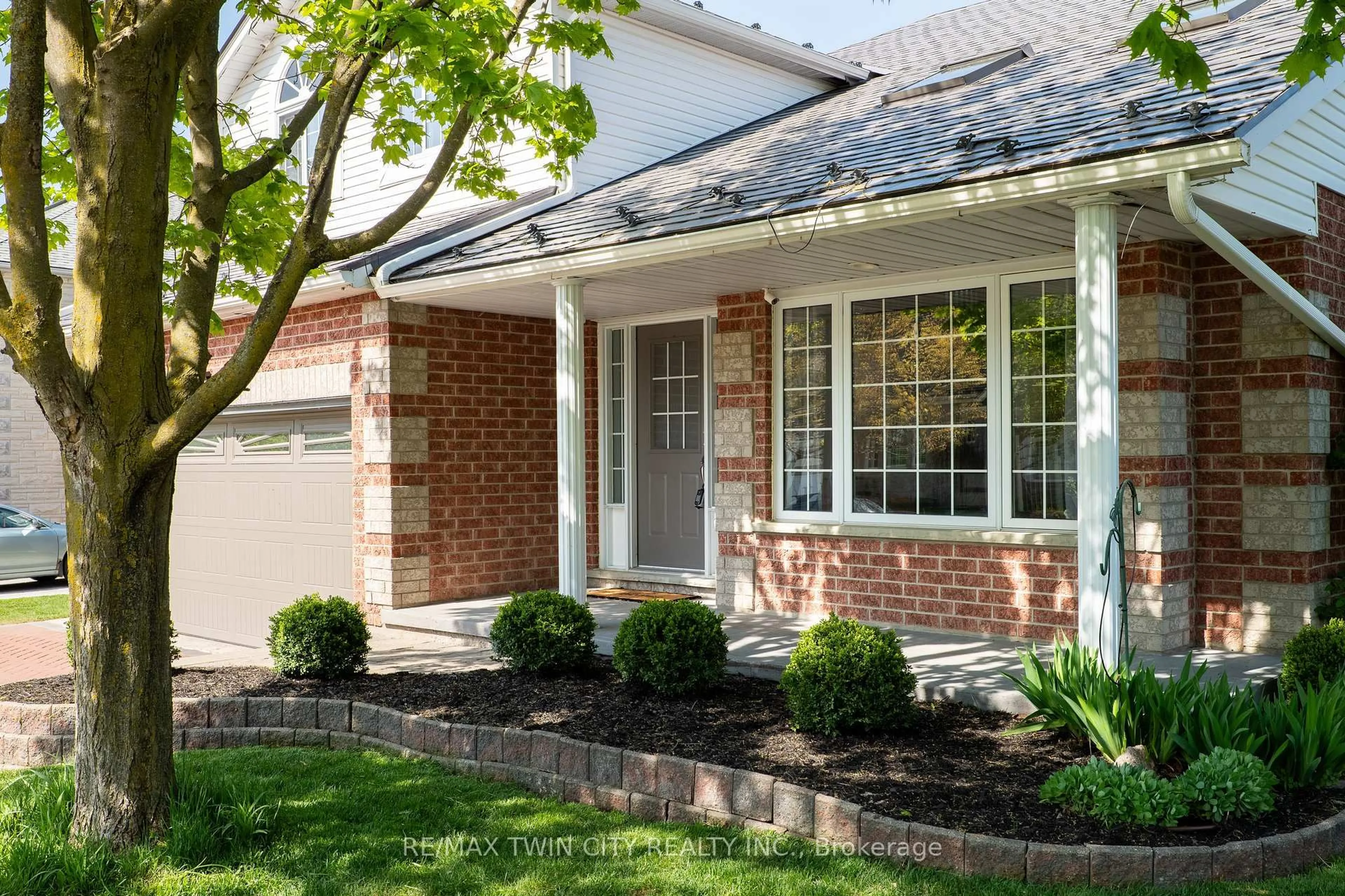 Home with brick exterior material, street for 314 Old Chicopee Tr, Kitchener Ontario N2A 4C8