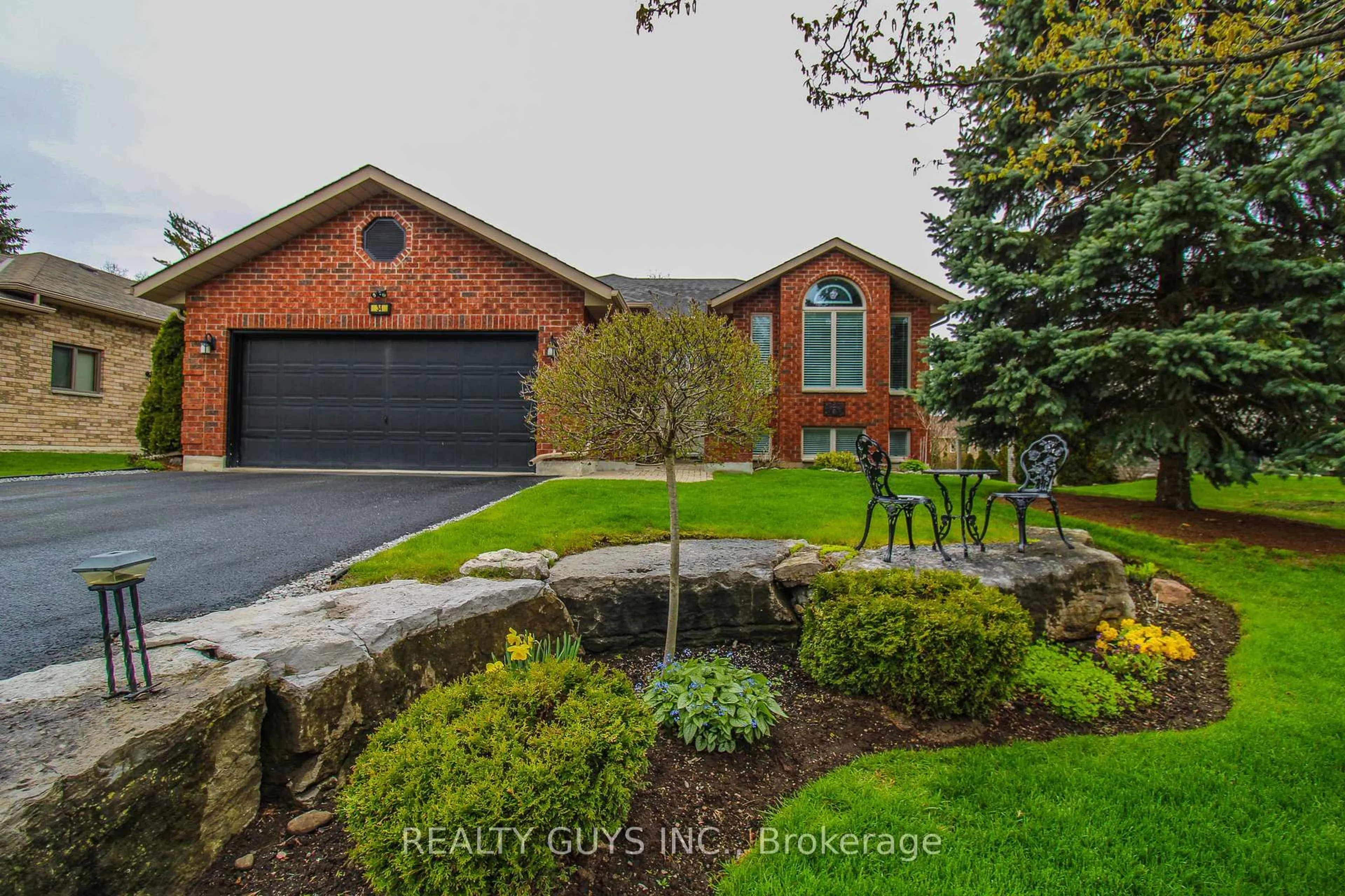 Home with brick exterior material, street for 34 Olde Forest Lane, Kawartha Lakes Ontario K0M 1A0