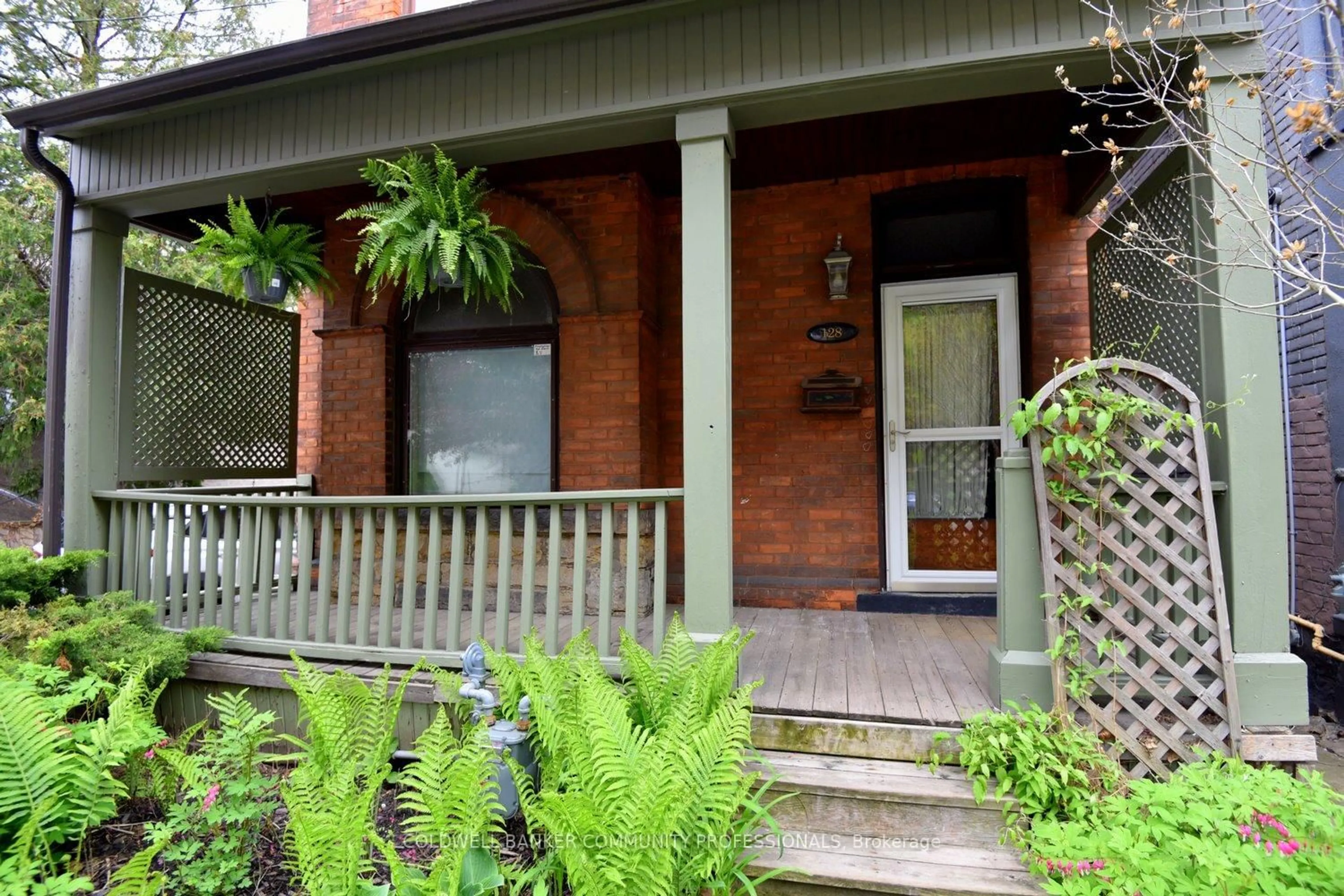 Home with brick exterior material, street for 128 Hess St, Hamilton Ontario L8P 3N6