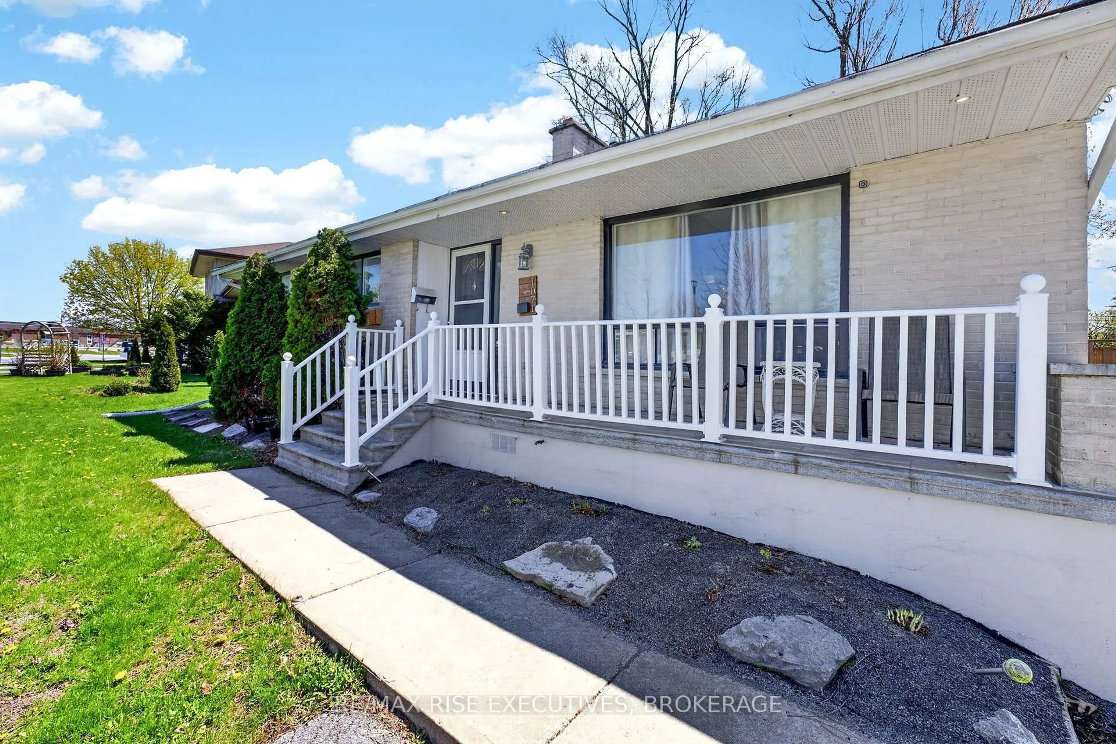 Home with vinyl exterior material, street for 1071 Hudson Dr, Kingston Ontario K7M 5K9